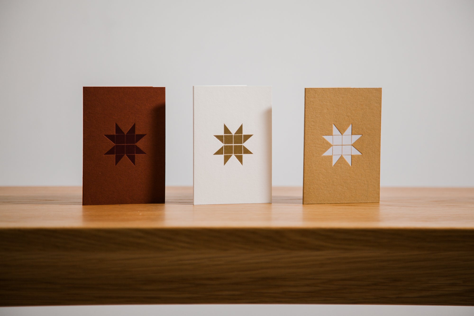 Small Froebel Star Card | Brass on Berry Red | Foil Blocked | by Ola - Lifestory