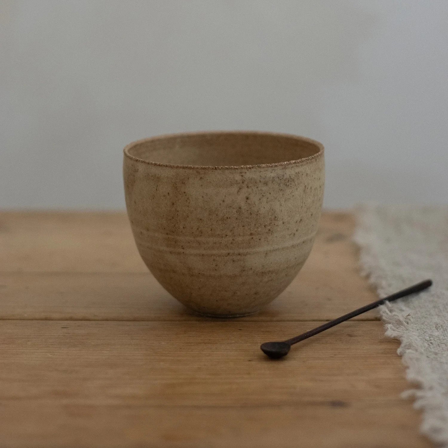 Curved Cup in Hay Glaze by Blanc Ceramics - Lifestory
