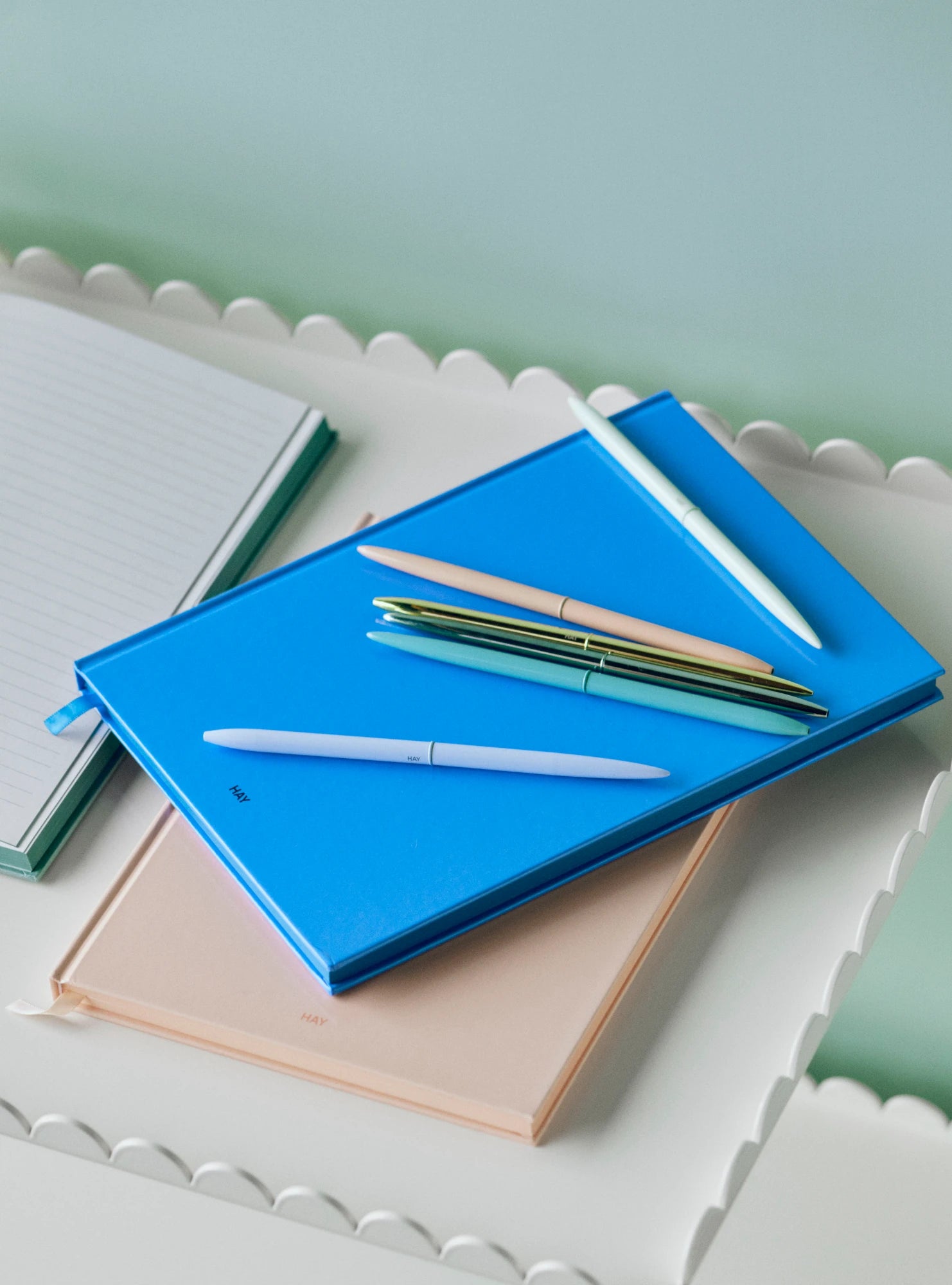 Bullet Pen family together on a pile of colourful notebooks by HAY