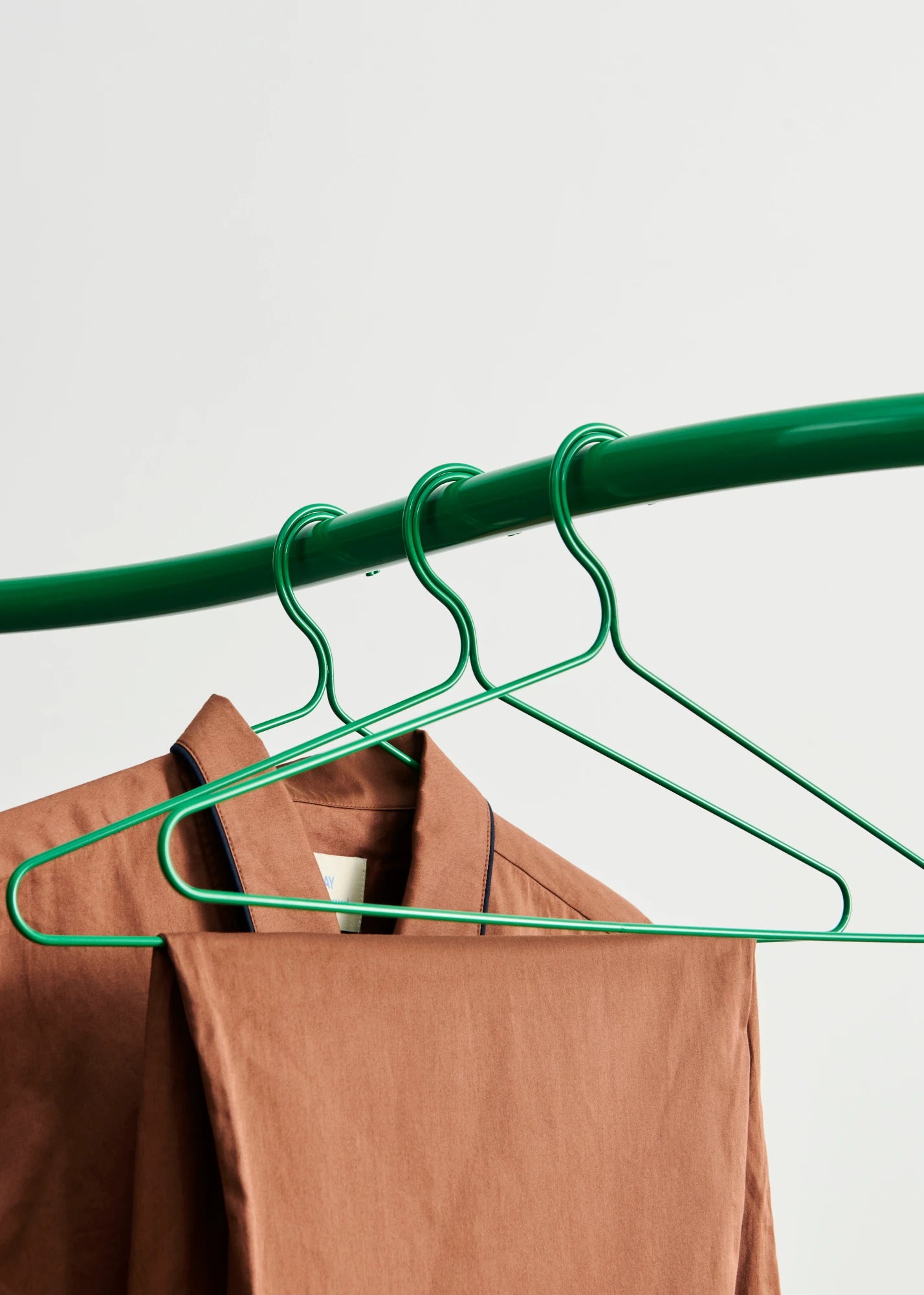 Set of 3 Colour Hangers in Jungle Green by HAY on a coat stand | Lifestory