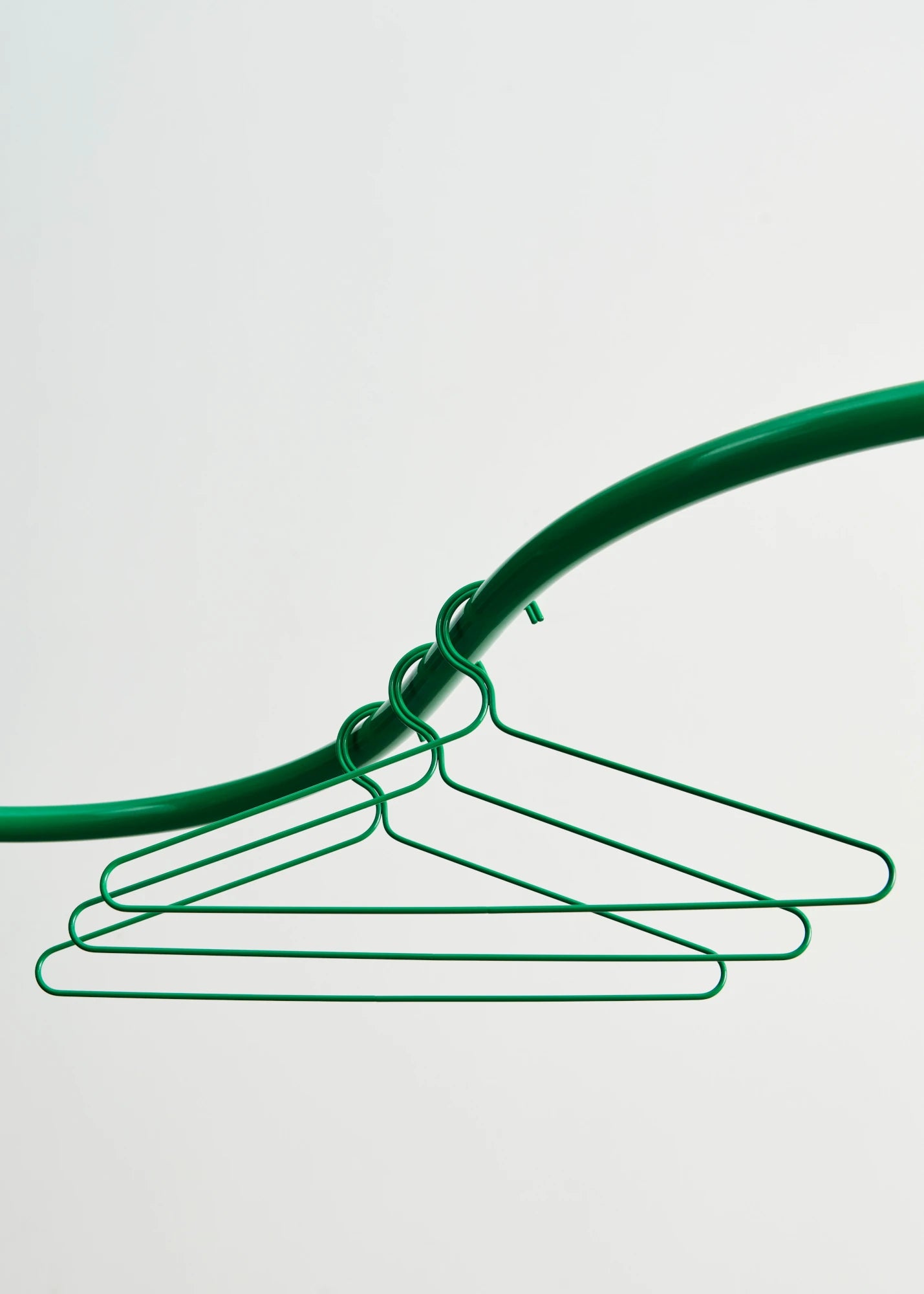 Set of 3 Colour Hangers in Jungle Green by HAY on a coat stand | Lifestory