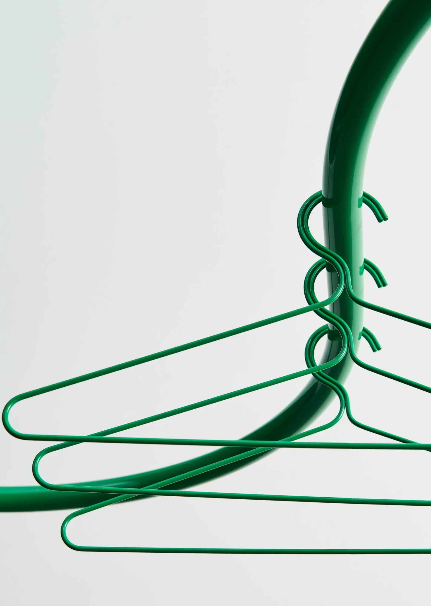 Set of 3 Colour Hangers in Jungle Green by HAY on a coat stand | Lifestory