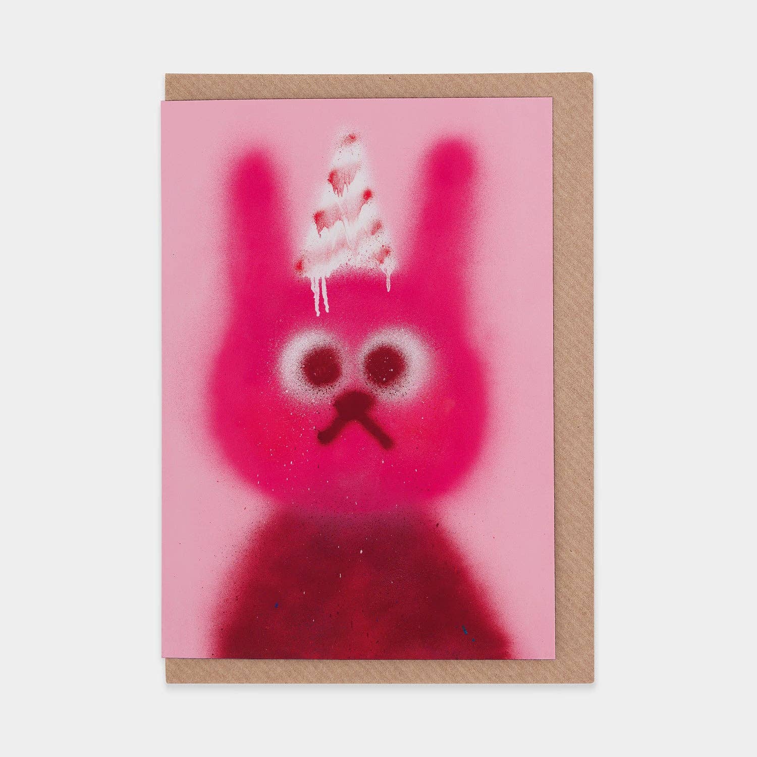 Bruised Tomato blank greetings card by Jon Burgerman - a pink spraypainted rabbit in a dripping white and red party hat