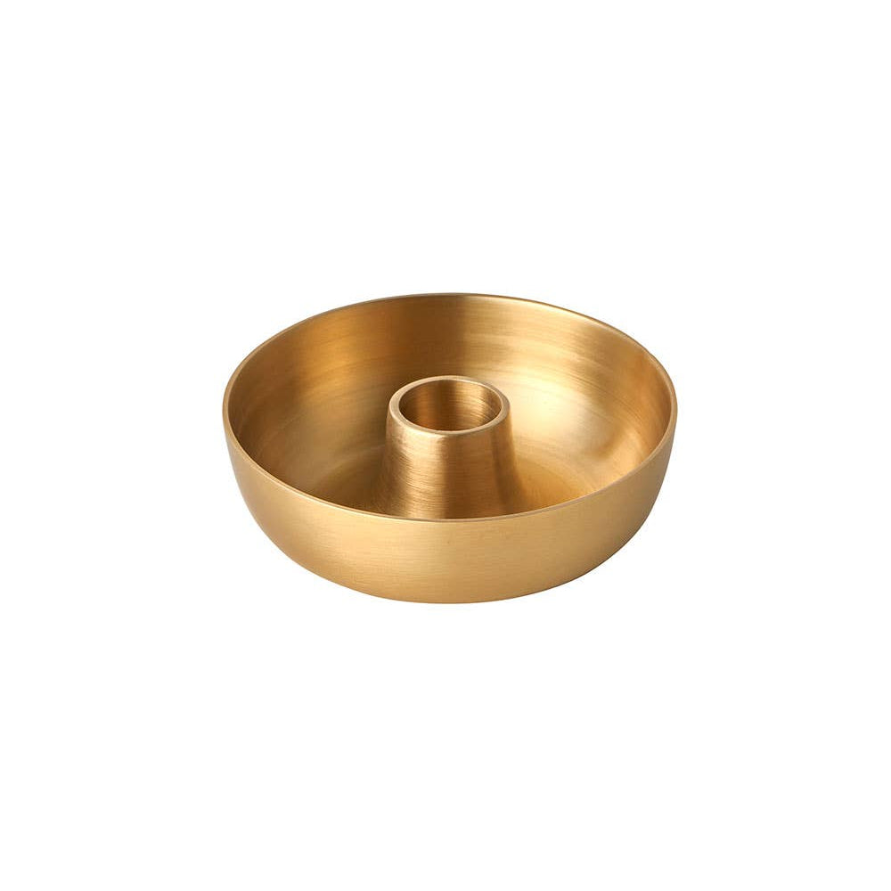 Gold candle holder on a white background