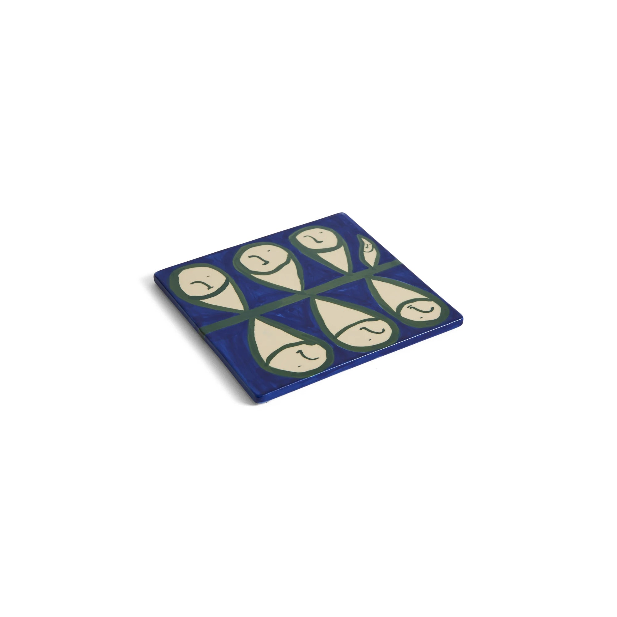 HAY x Emma Kohlmann - La Pittura Trivet in Peters Plant design viewed at an angle