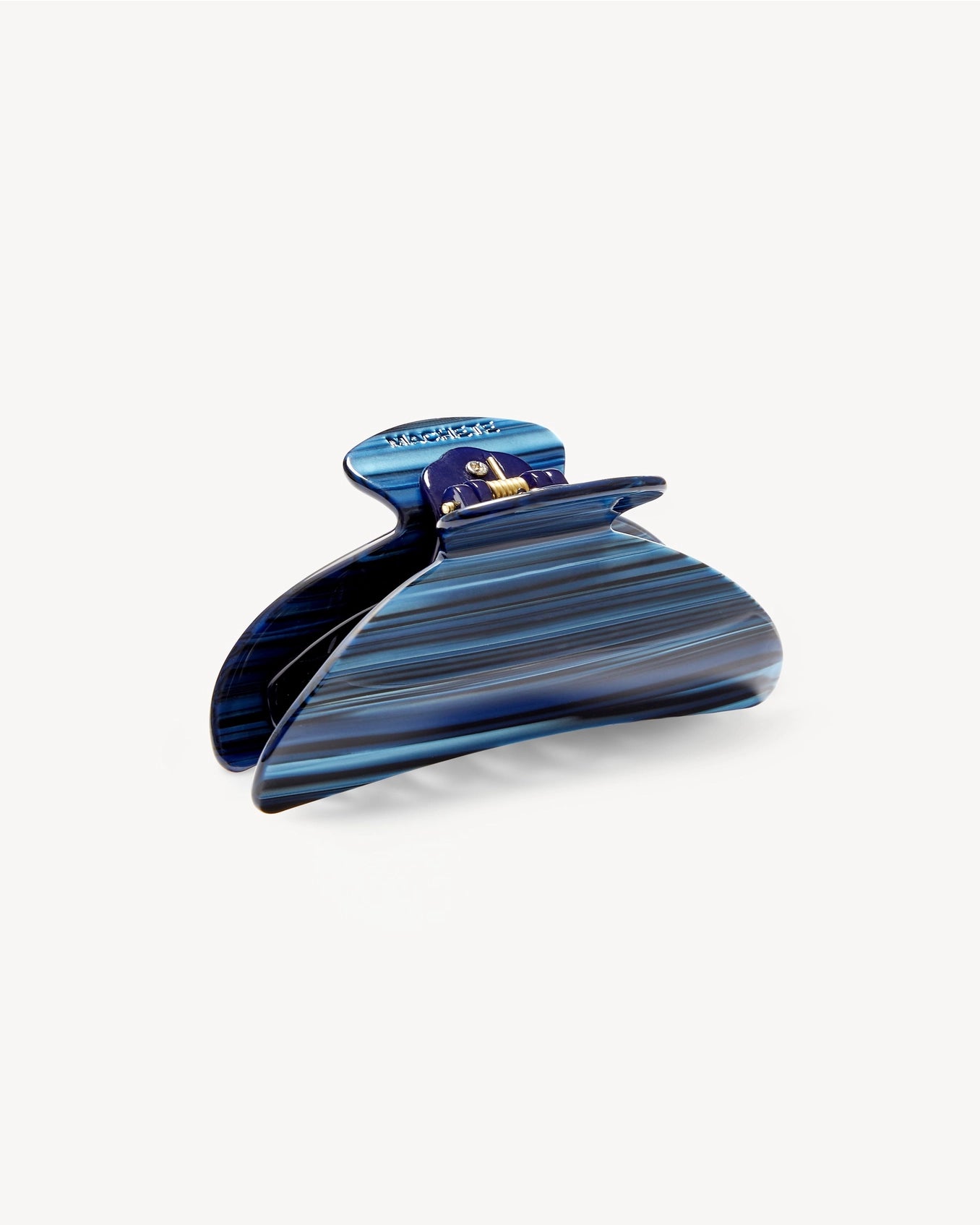 Blue hair clip on a white background