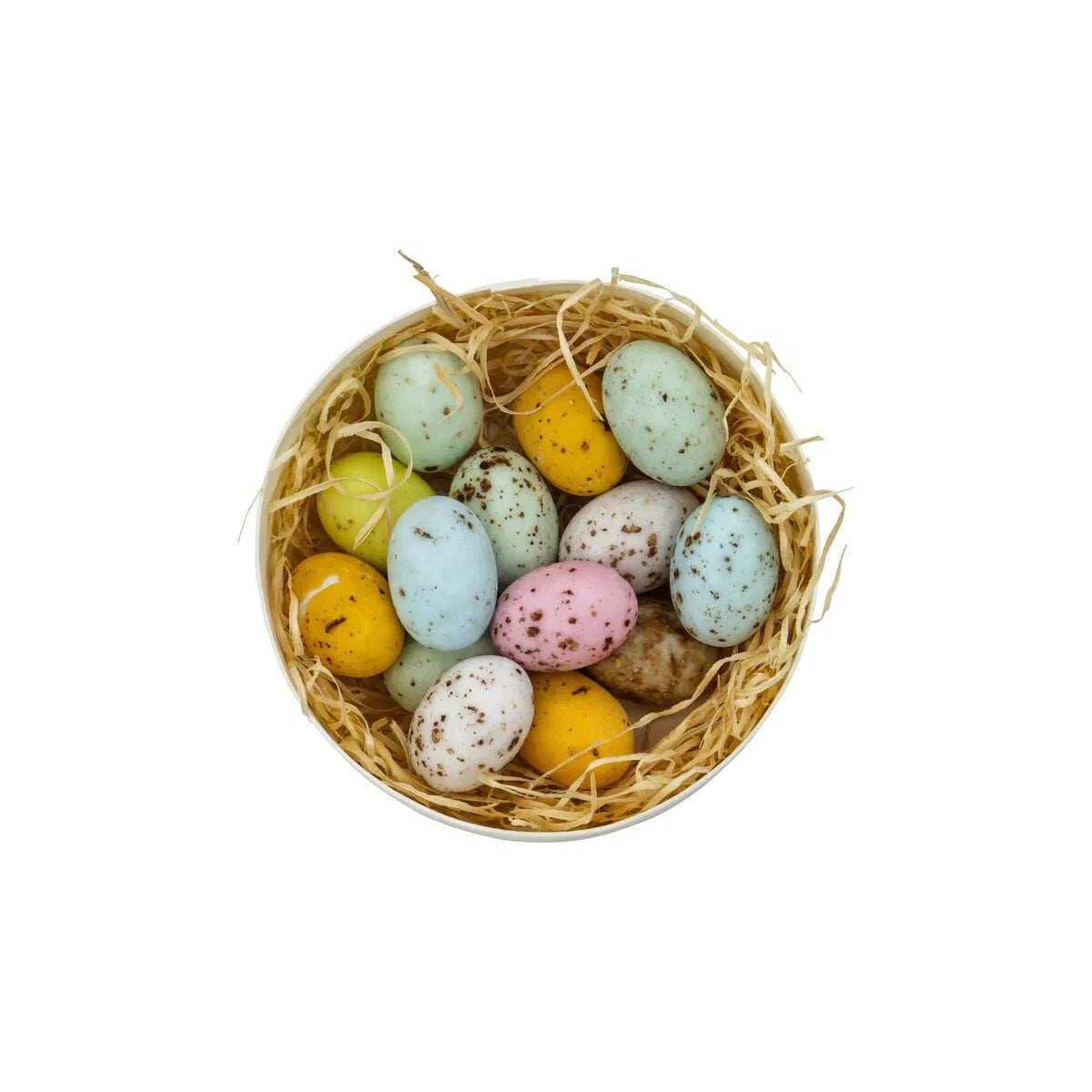 Pastel-colored Easter eggs in a nest on a white background