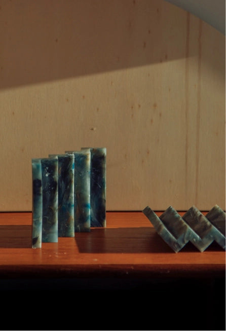 Müll Club Recycled Plastic Zip-Zag Soap Dish in Marble colourway against a wooden table and beige background