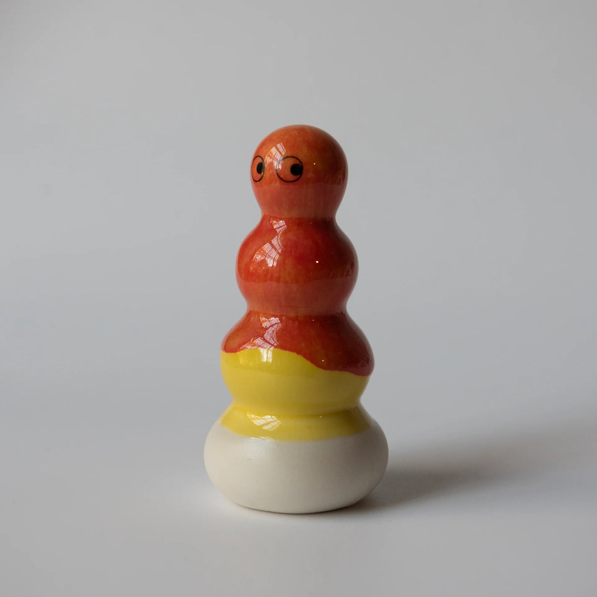 Studio Arhoj Familia Figurine, Polo | Apollo in an Orange Glaze