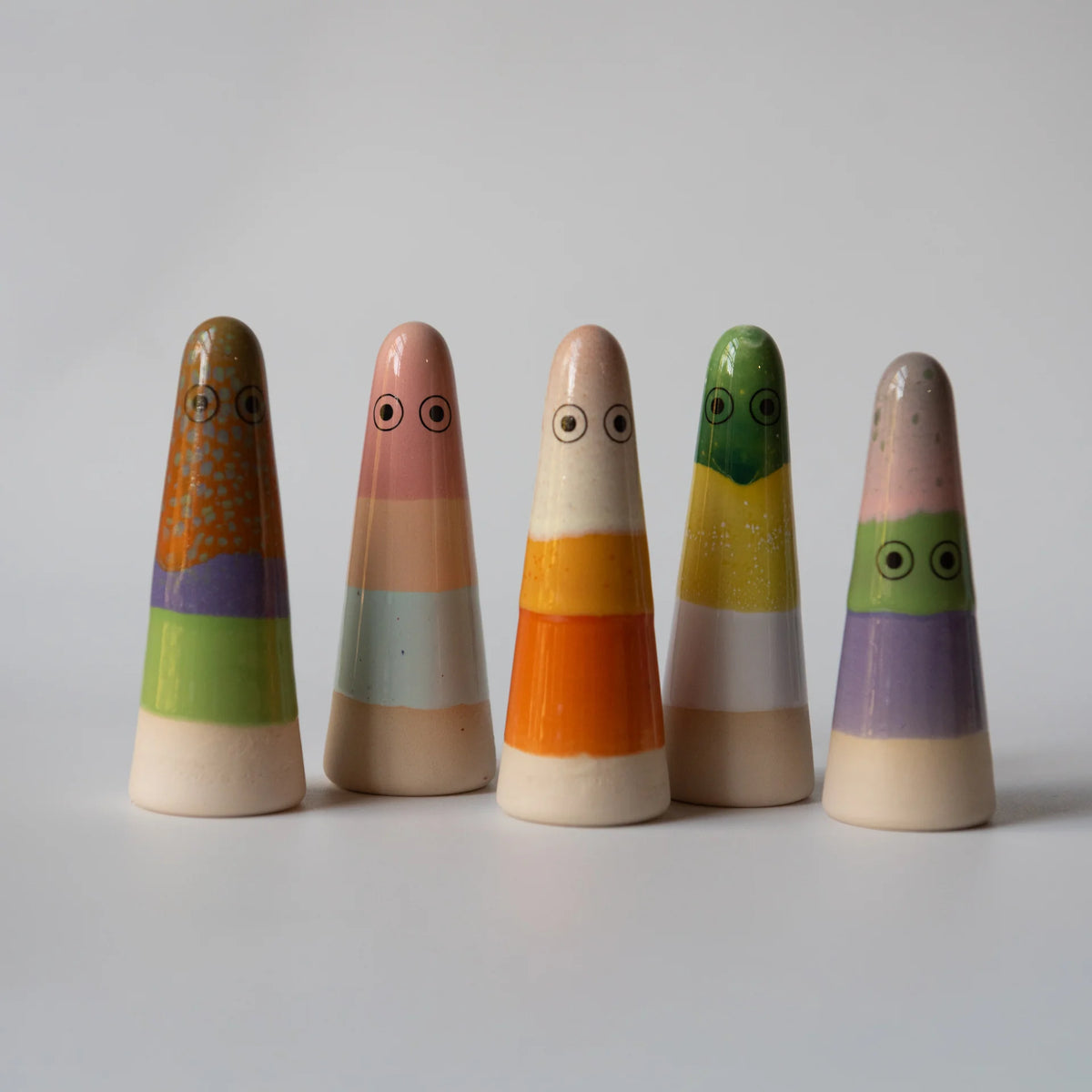 A collection of 5 studio arhoj striped ghosts