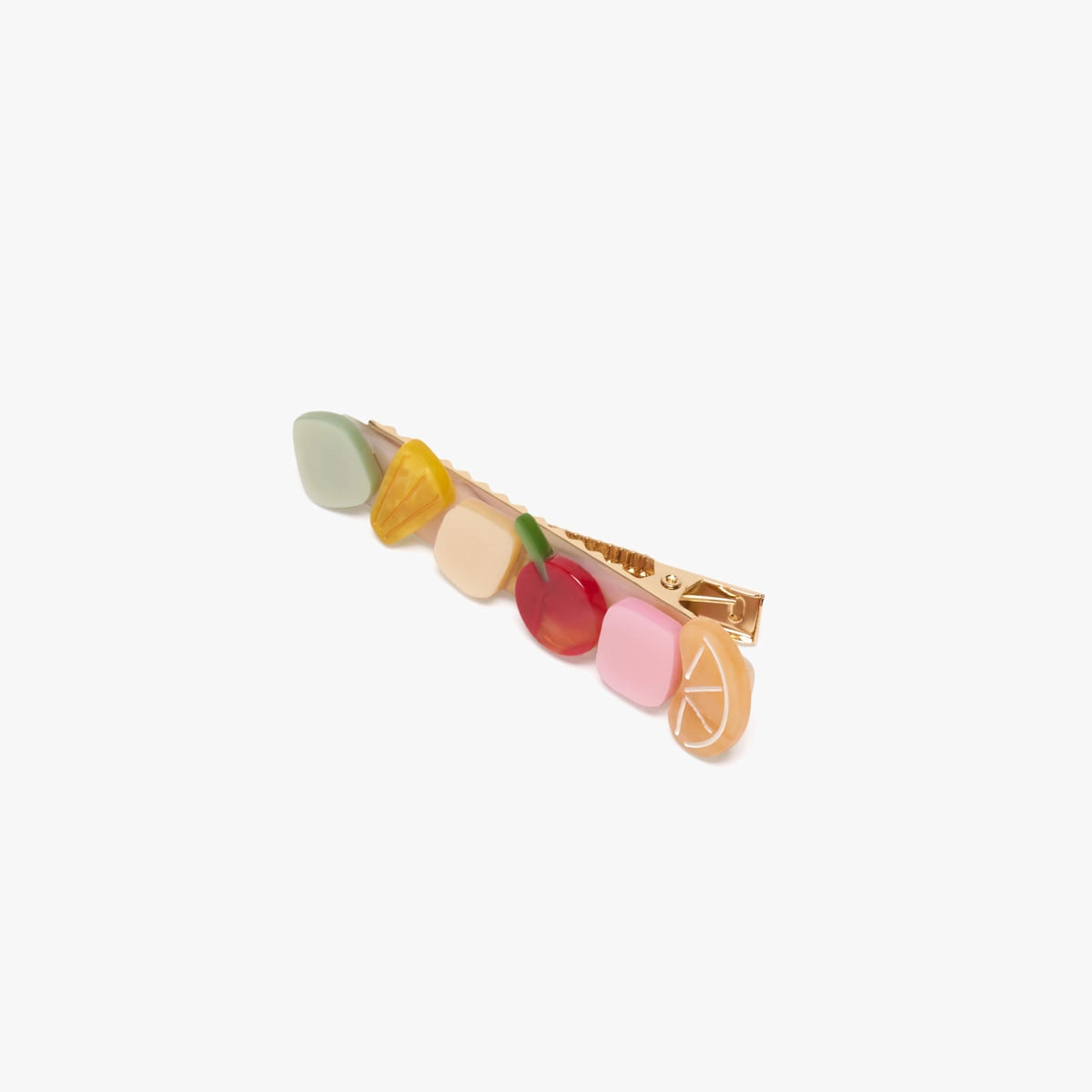 Colorful hair clip with fruit-shaped charms on a white background