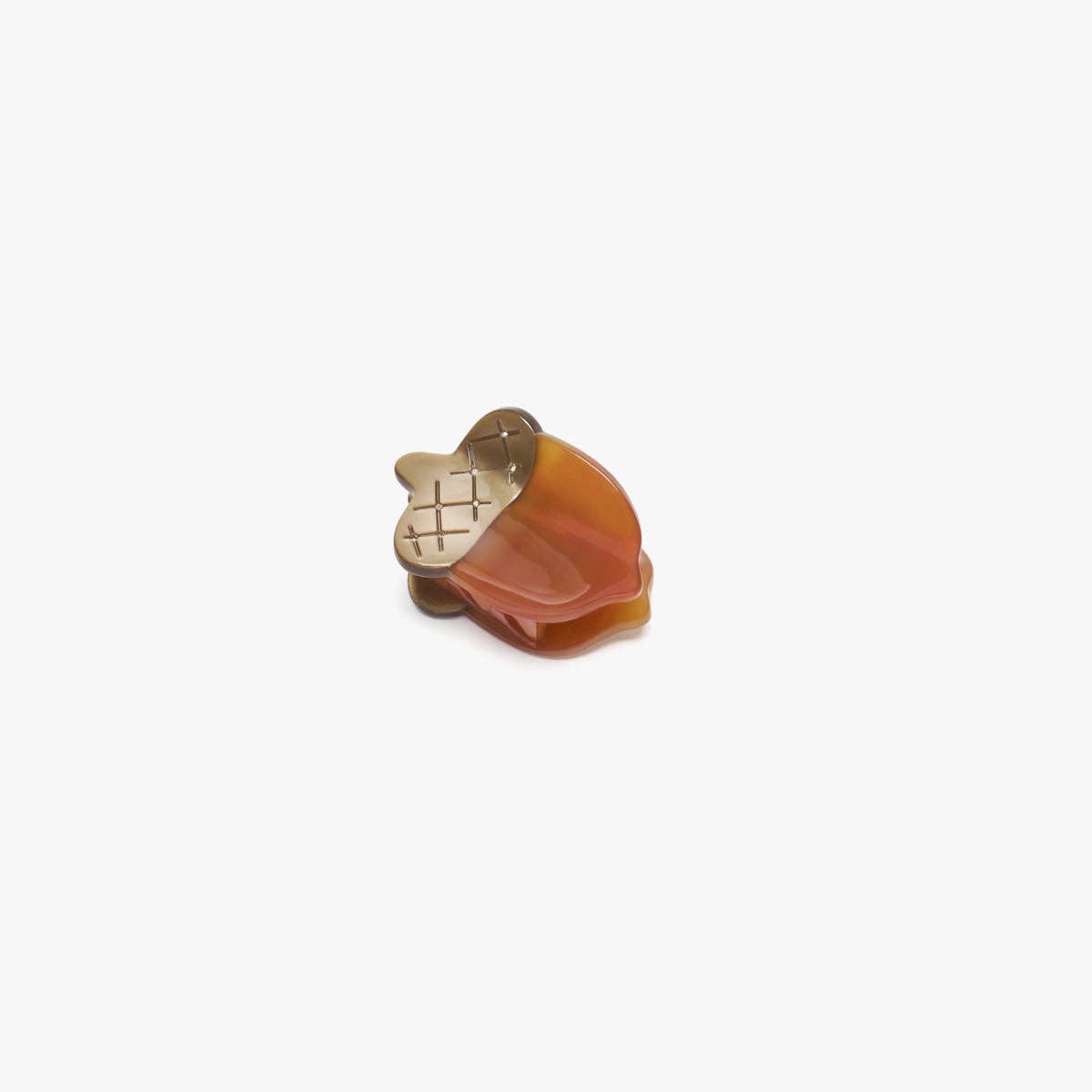 Acorn-shaped hair clip on a white background