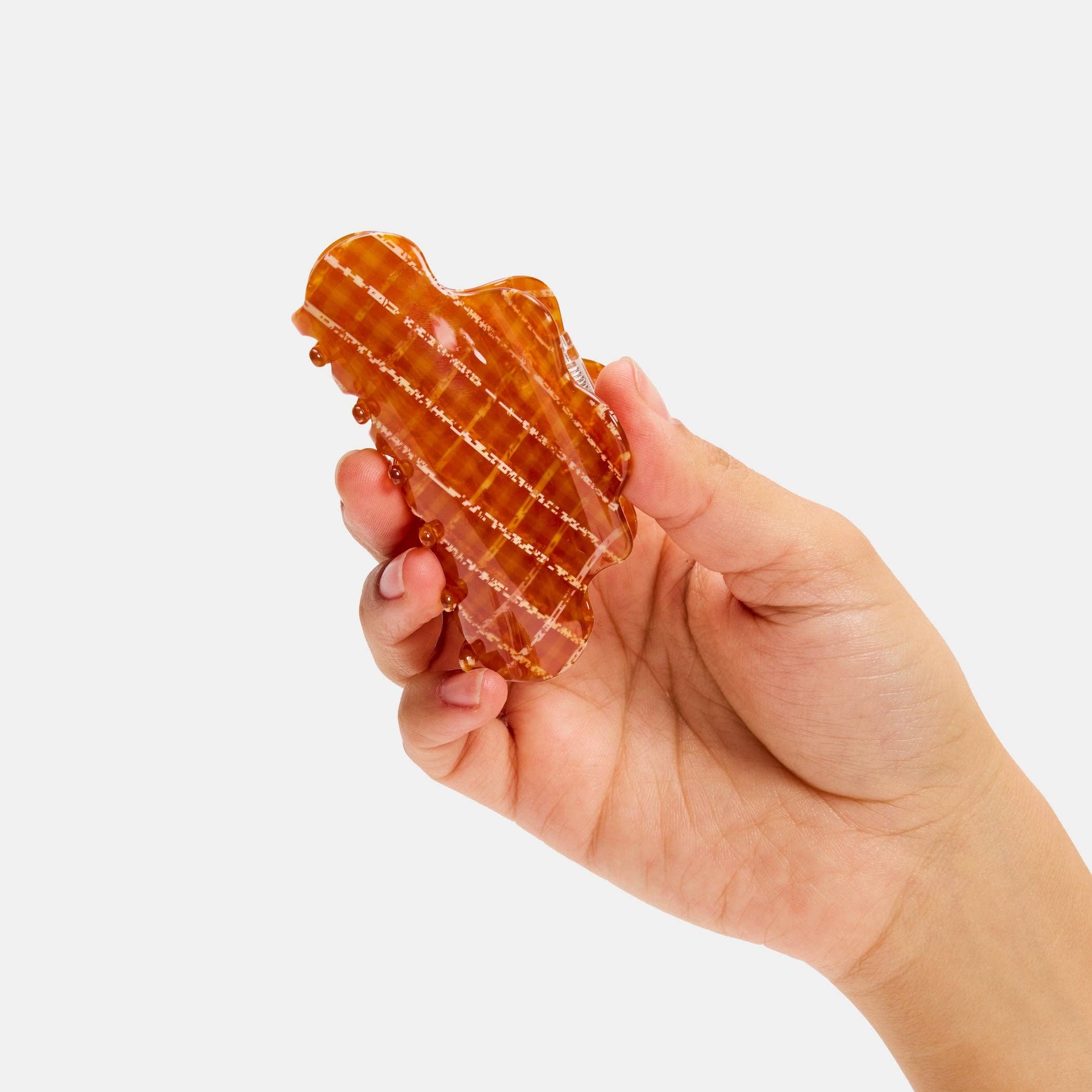 CHUNKS Baby Nimbus Hair Claw in Caramel Plaid in models hand