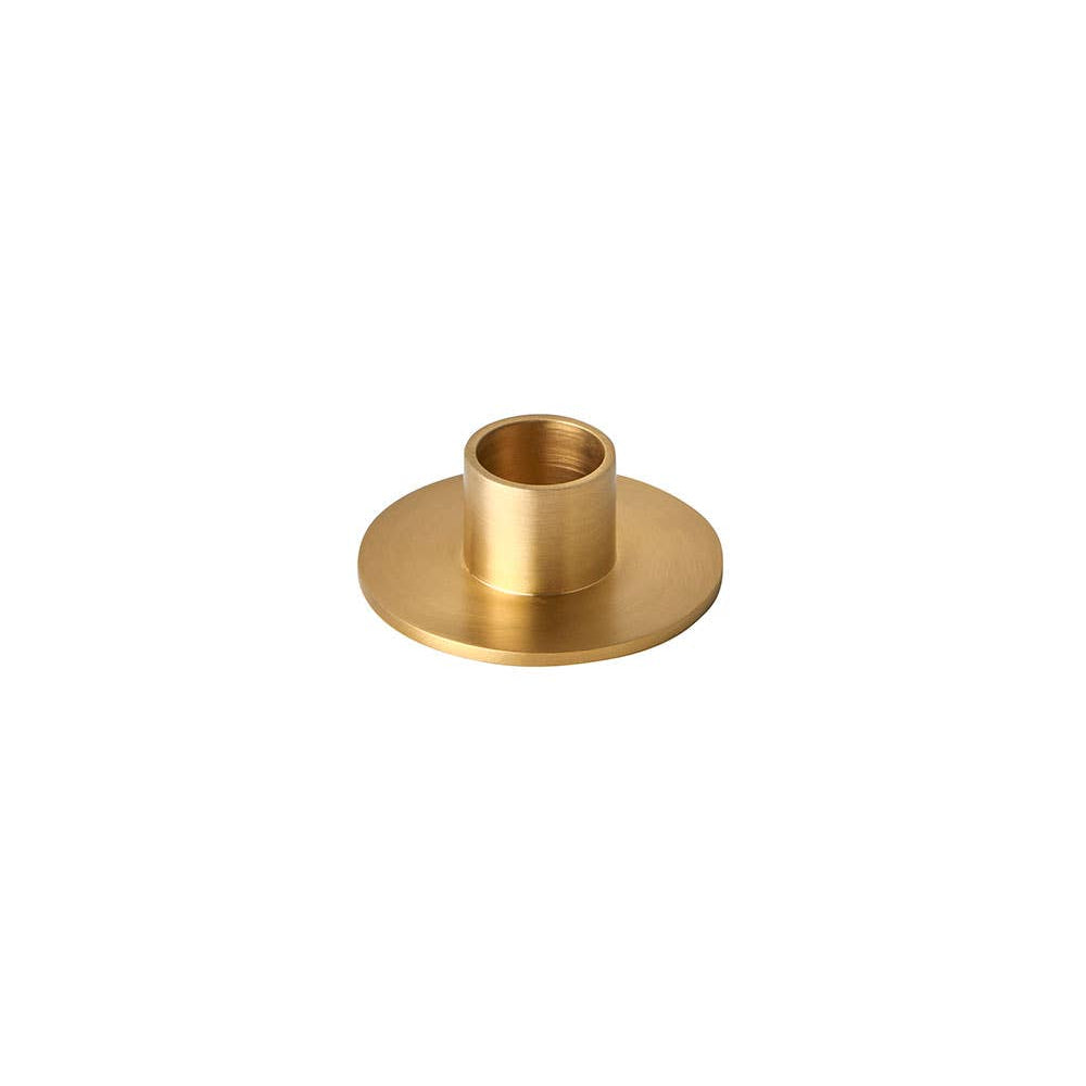 Small brass round candle holder on a white background