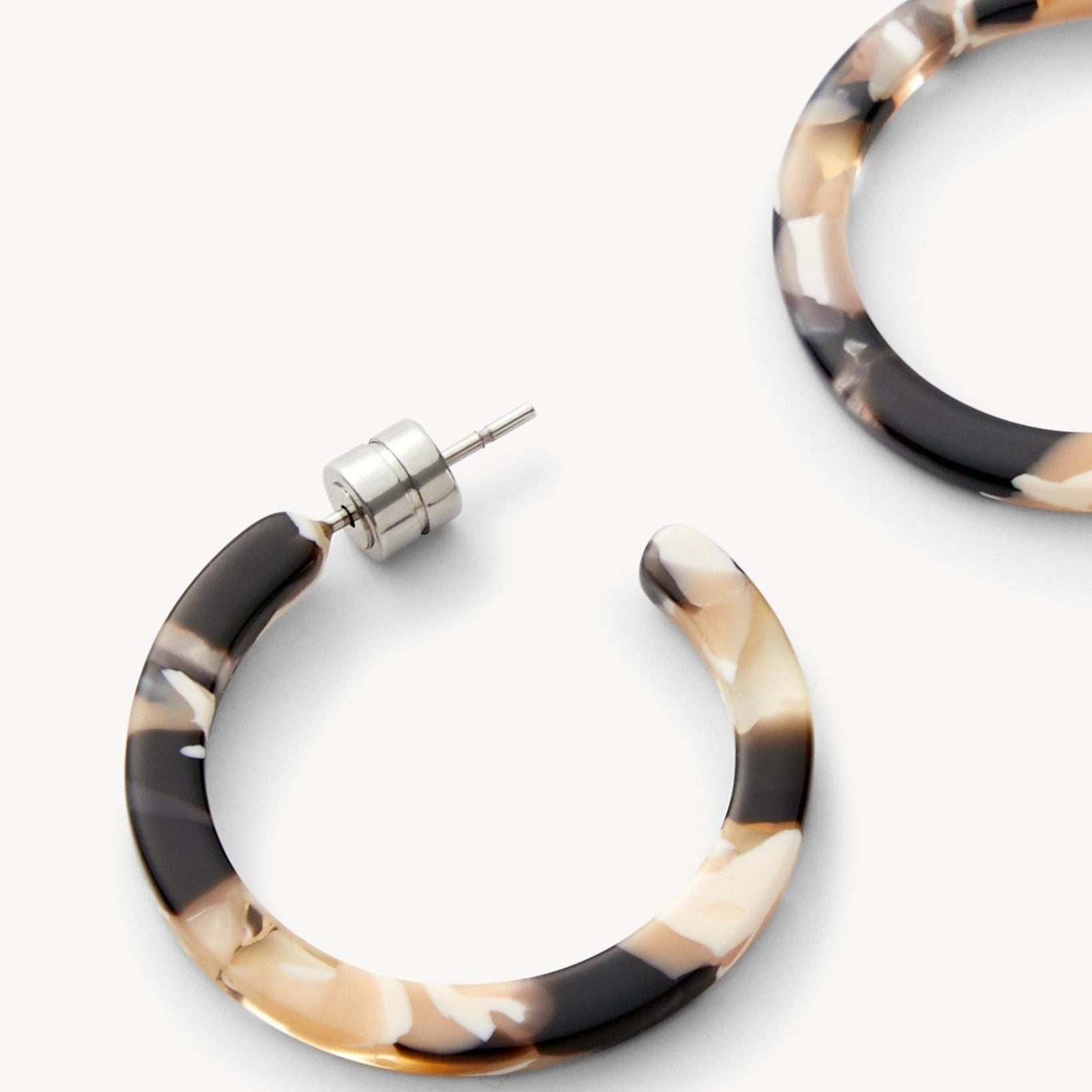 MACHETE Mini Hoops in Abalone Acetate on a white background up close