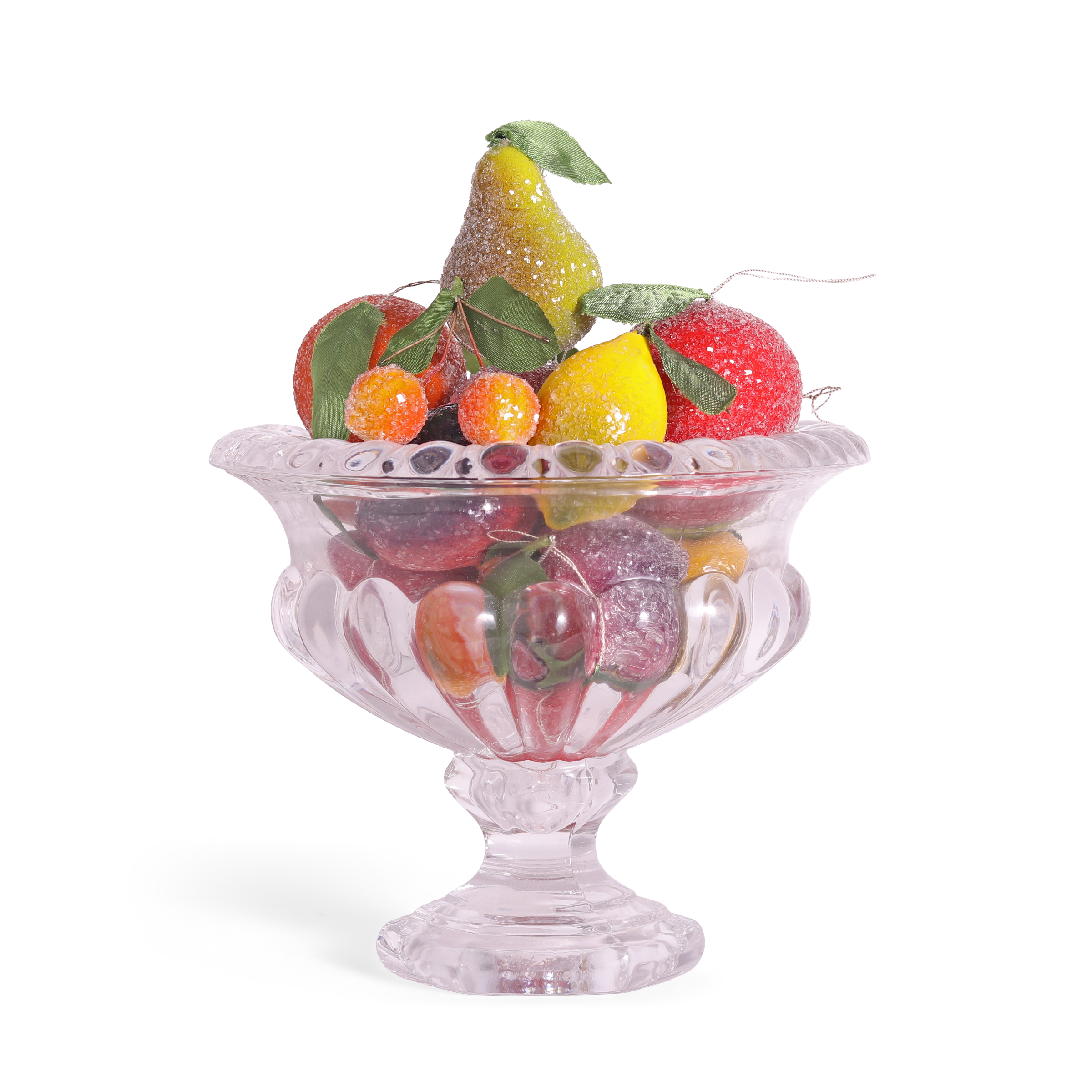 Decorative glass bowl filled with colorful frosted ornamental fruit on a white background