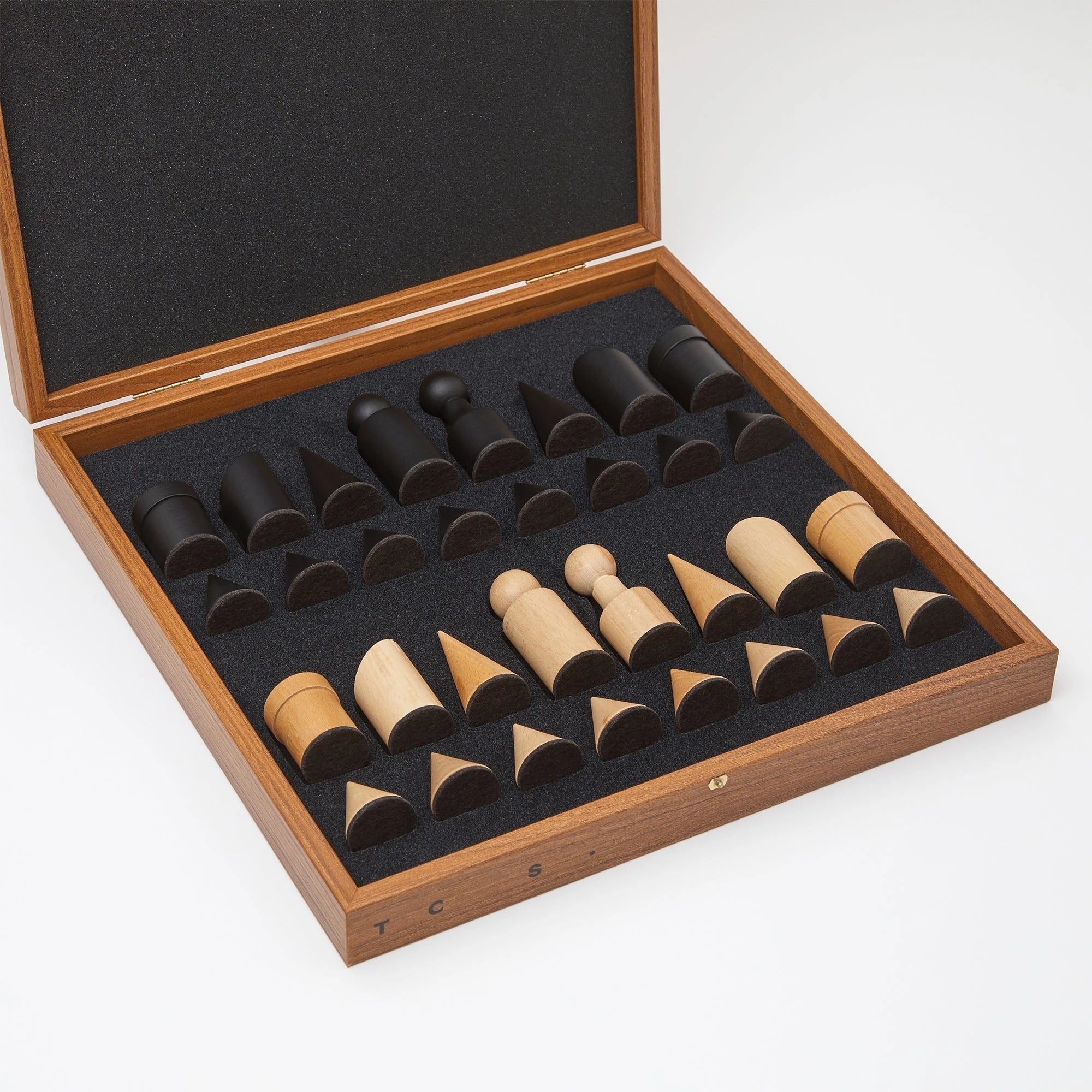 Milos Wooden Chess Set by The Conran Shop in black and white internal view of piece storage