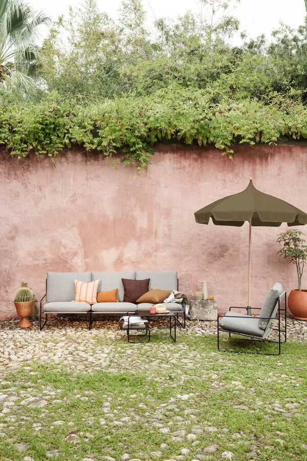 ferm Living outdoor furniture in a garden - part ofthe outdoor furniture collection at Lifestory 