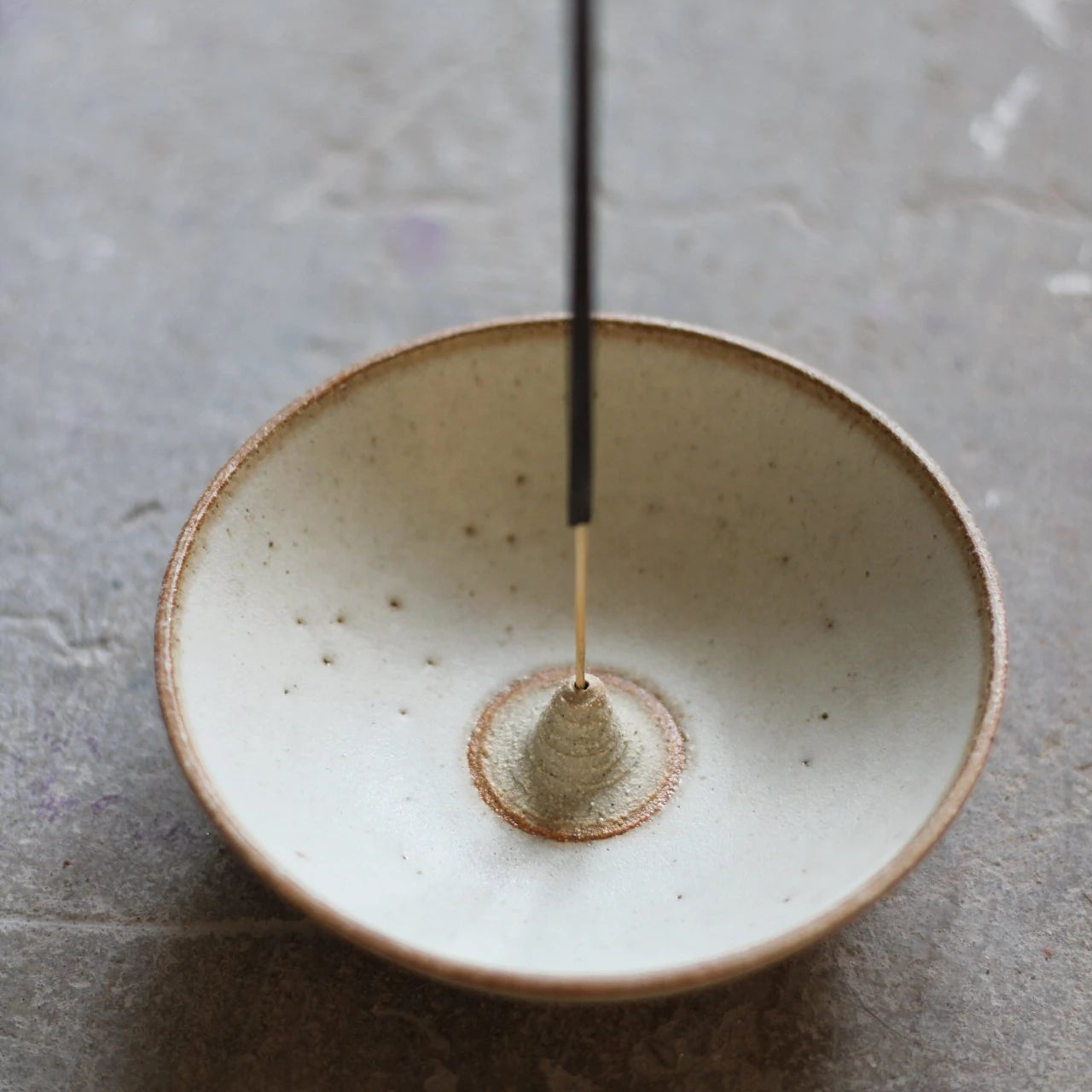 Aku Ceramics Incense stick holder in  Ivory glaze with incense stick