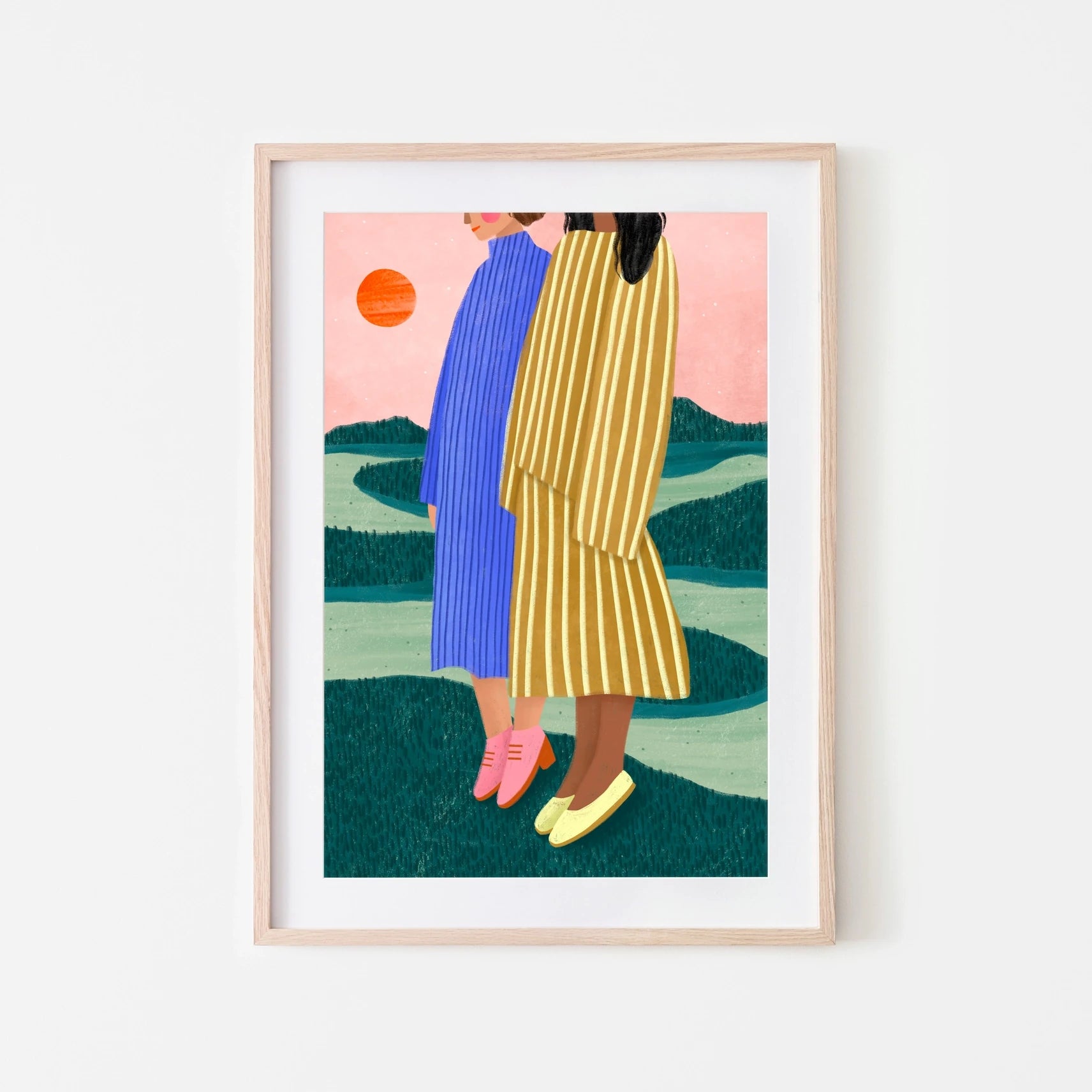 Bea Müller 'Friends With Striped Dresses' A3 Unframed Art Print IN DEMONSTRATION LIGHT OAK FRAME AGAINST A WHITE WALL