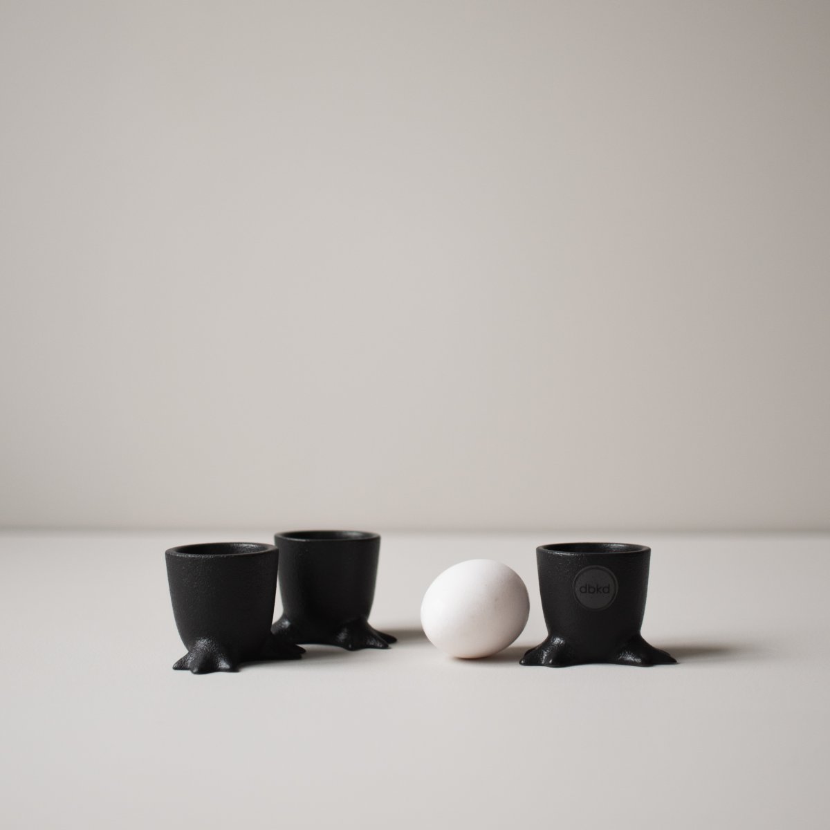 Walking Egg Cup in Black Cast Iron Effect Ceramic by DBKD