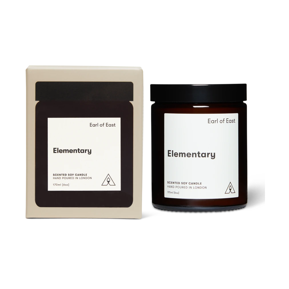 Earl of East 'Elementary' scented soy candle with packaging on a white background