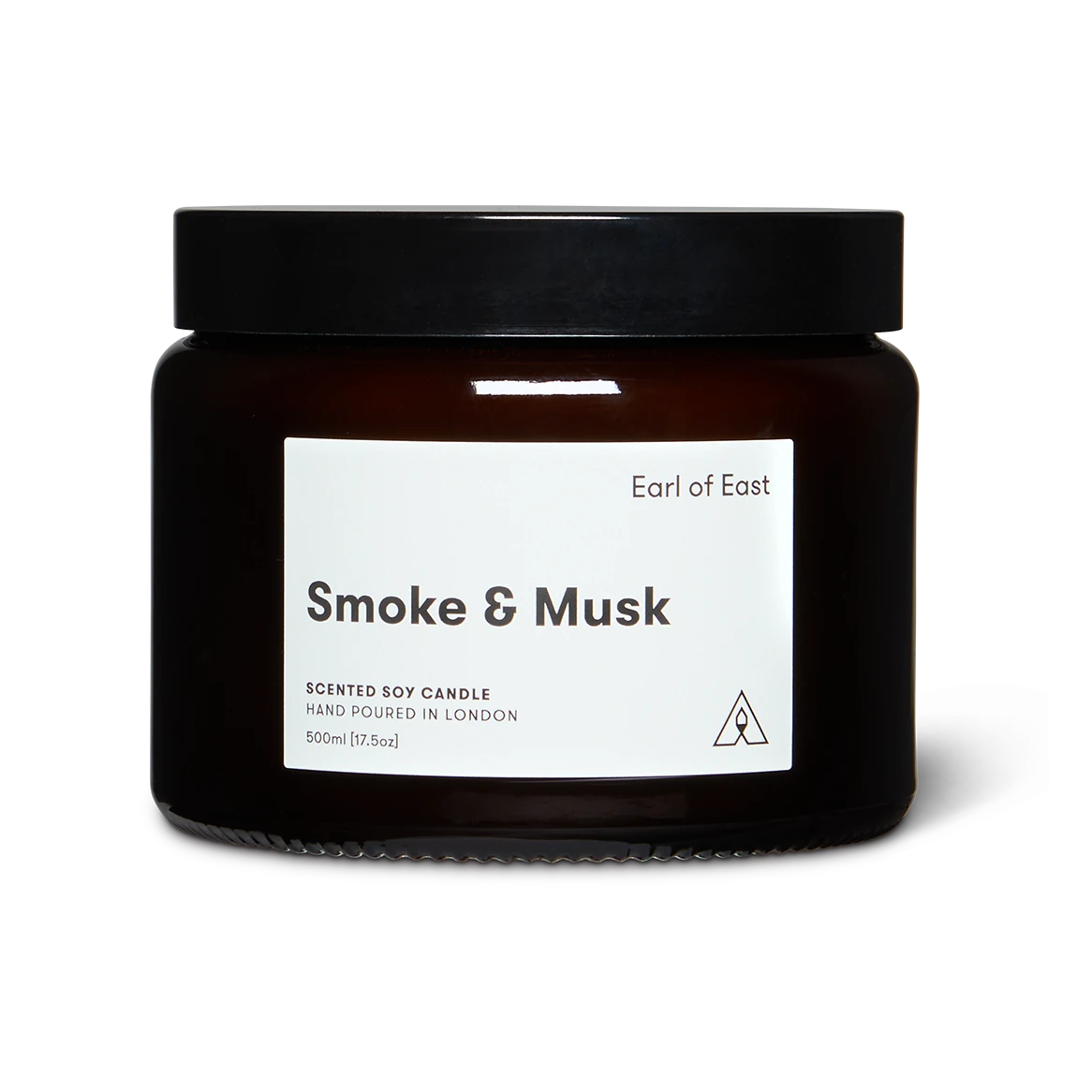 Candle jar labeled 'Smoke & Musk' by 'Earl of East' on a white background