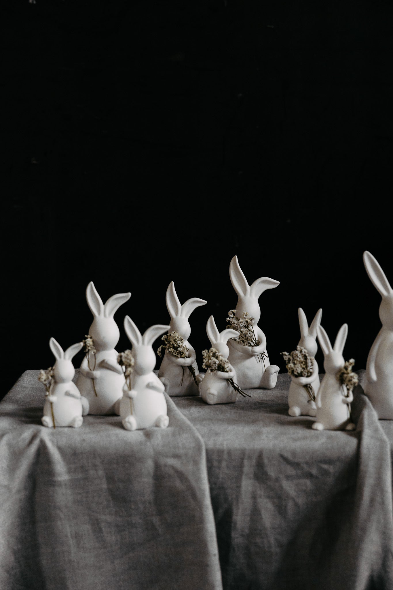 Various sizes of the ceramic Emilia rabbit ornament with flowers from Storefactory