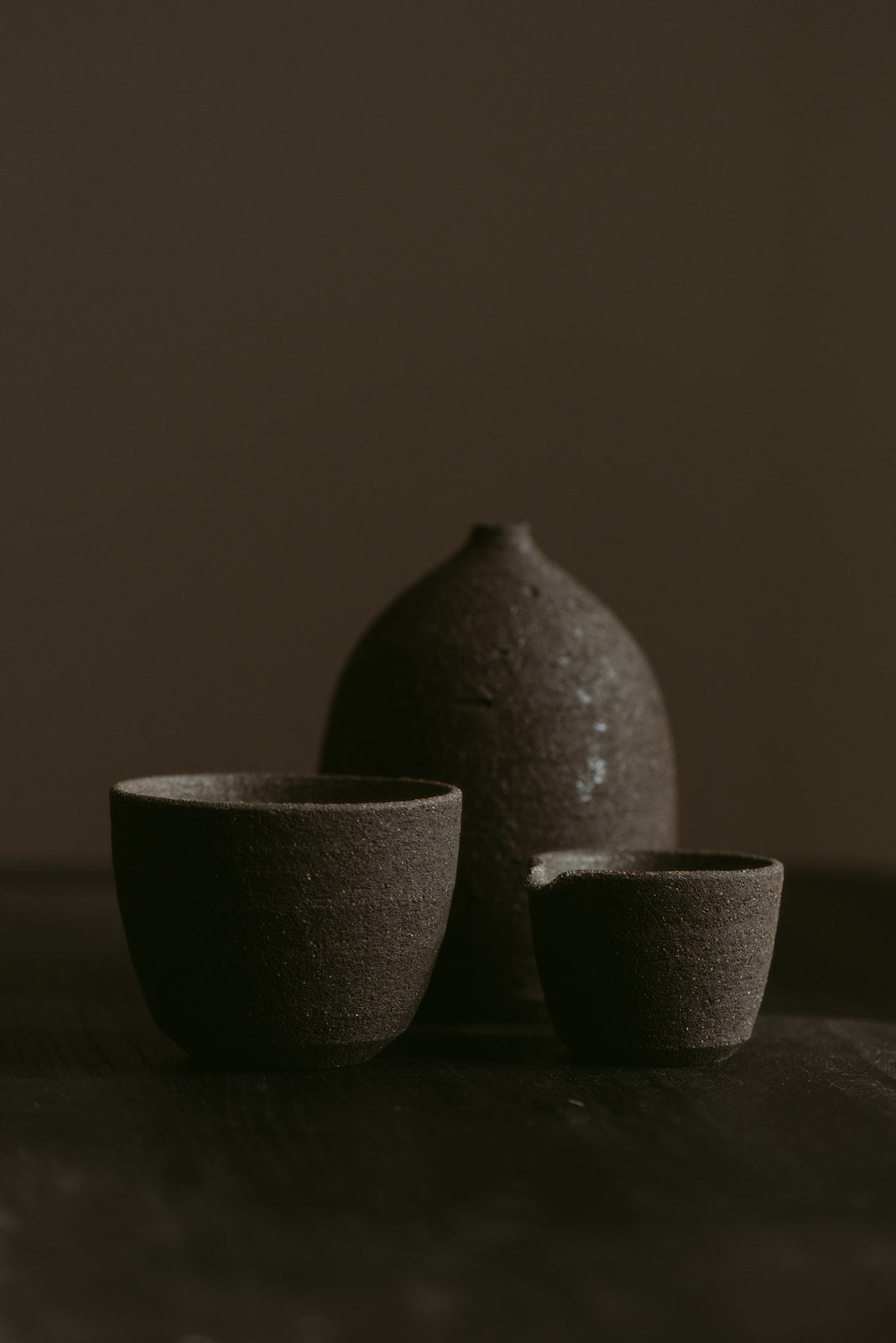 Metamorphosis Group Set of 3 | Night | Vase, Cup, Pourer in Wild Clay & Sand | by Emporium Julium