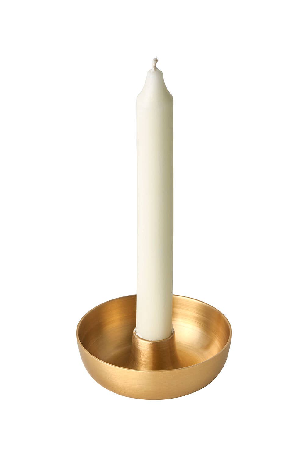 Gold candle holder with a white candle on a white background
