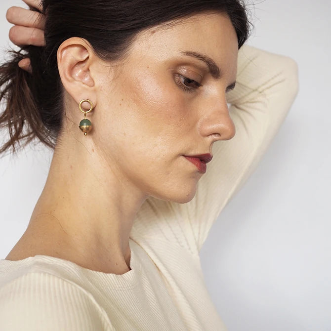 Profile image of a female model wearing Form Brass Circle, green Bead & Cup Earrings by brass+bold from Lifestory Edinburgh