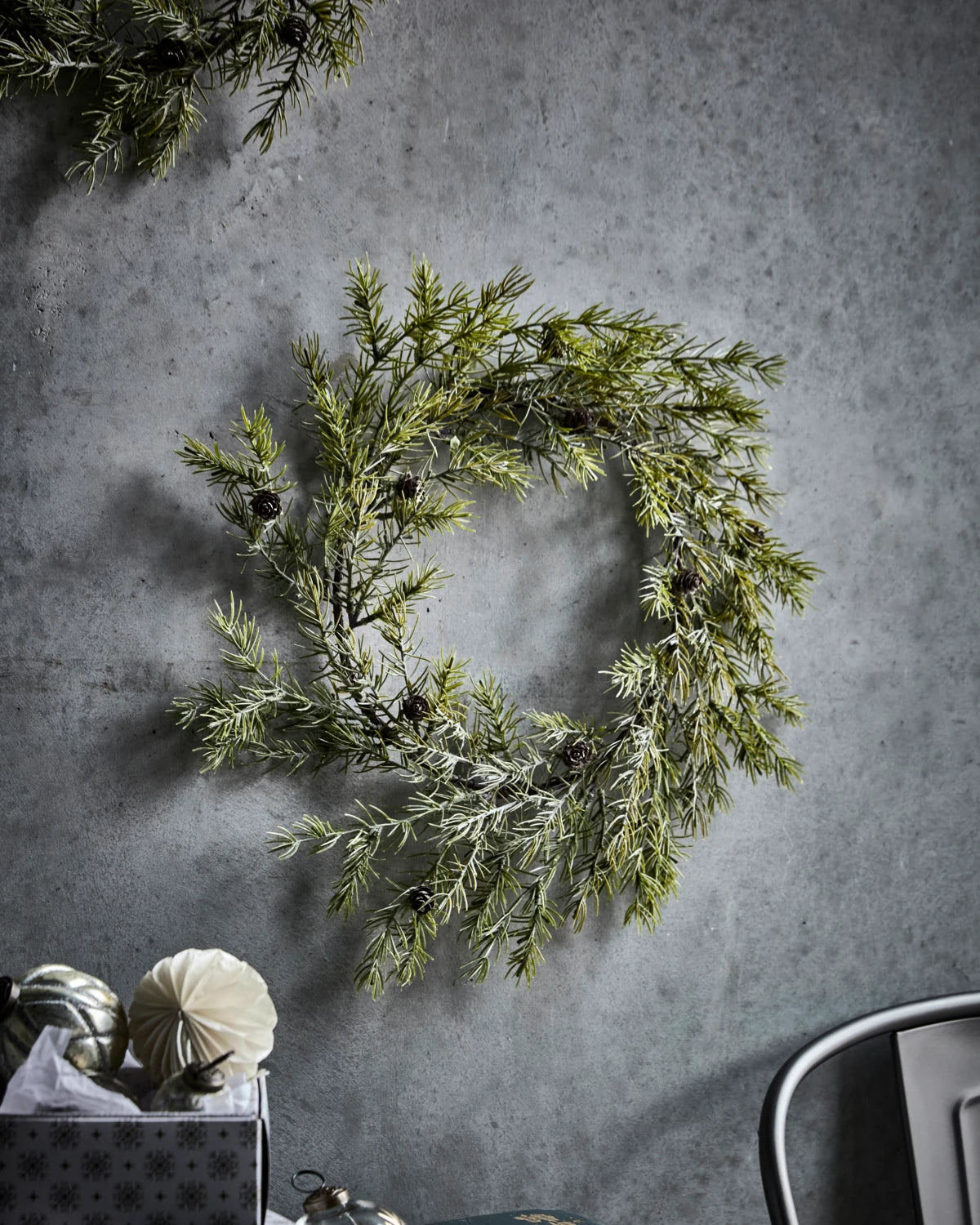 House Doctor 'Frost' Door Wreath - 45cm context image against a textured grey wall