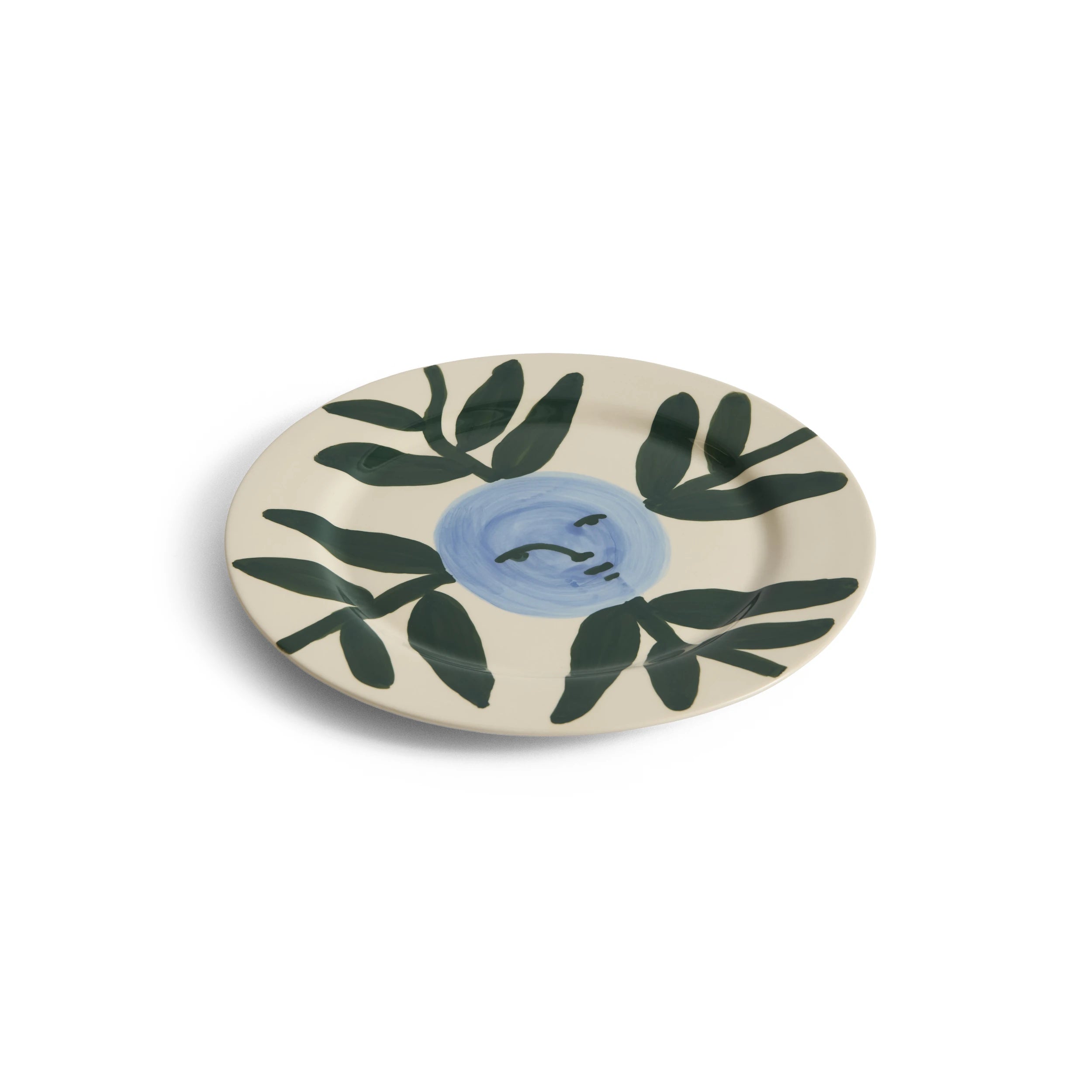 HAY x Emma Kohlmann - La Pittura Ø28.5cm Plate in Moon Face Vine design viewed at an angle