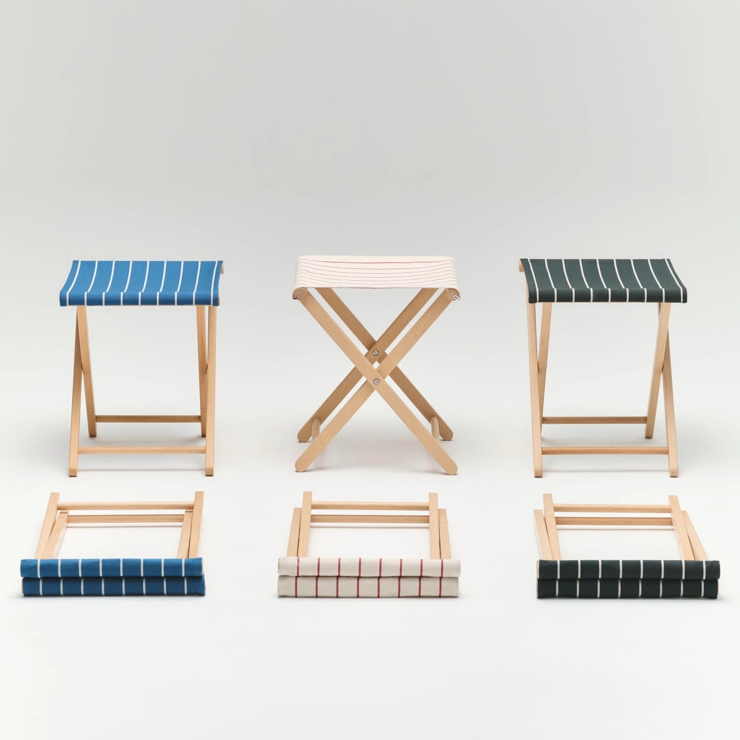 Set of stools with woven seats on a white background