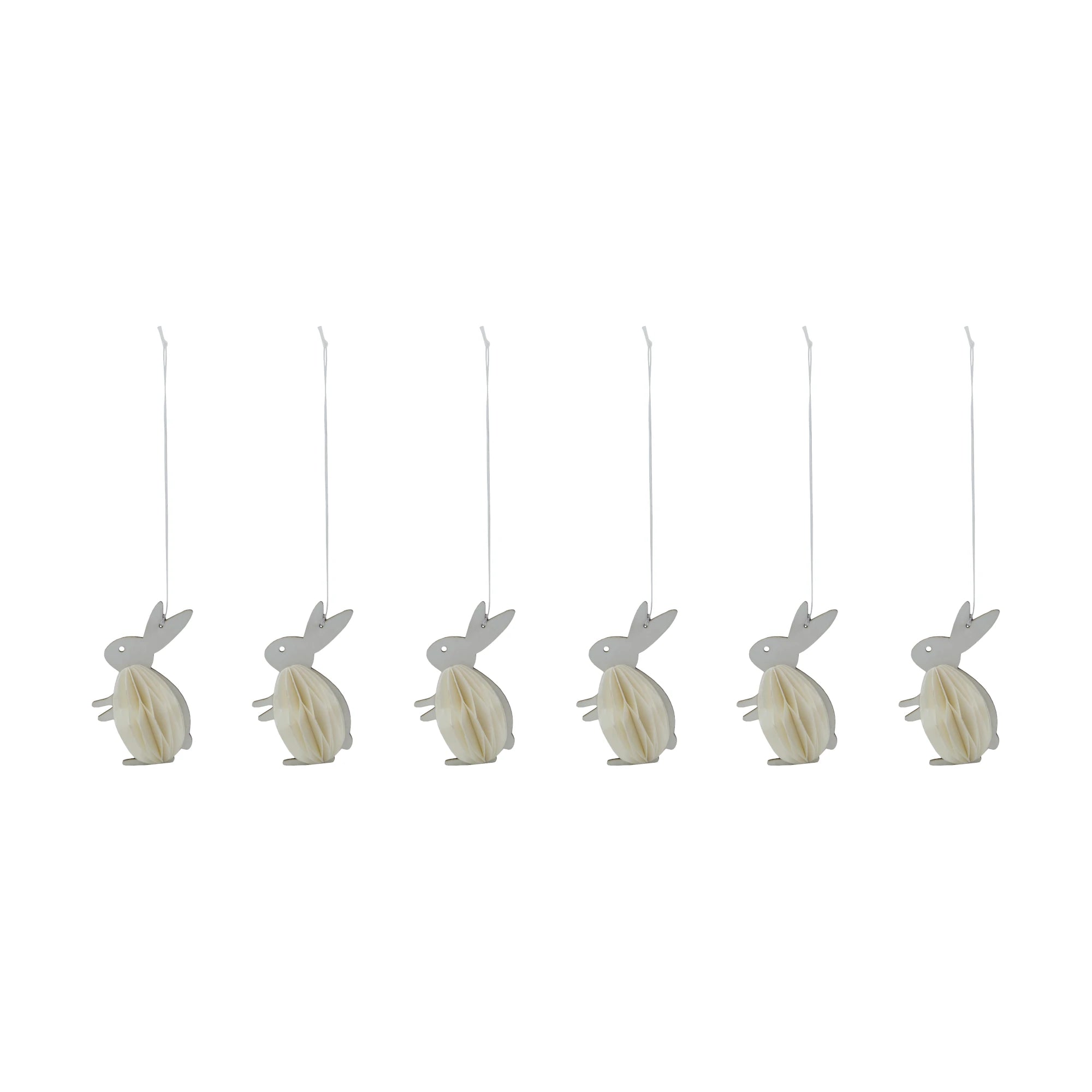 Six white  hanging bunny-shaped decorations on a white background