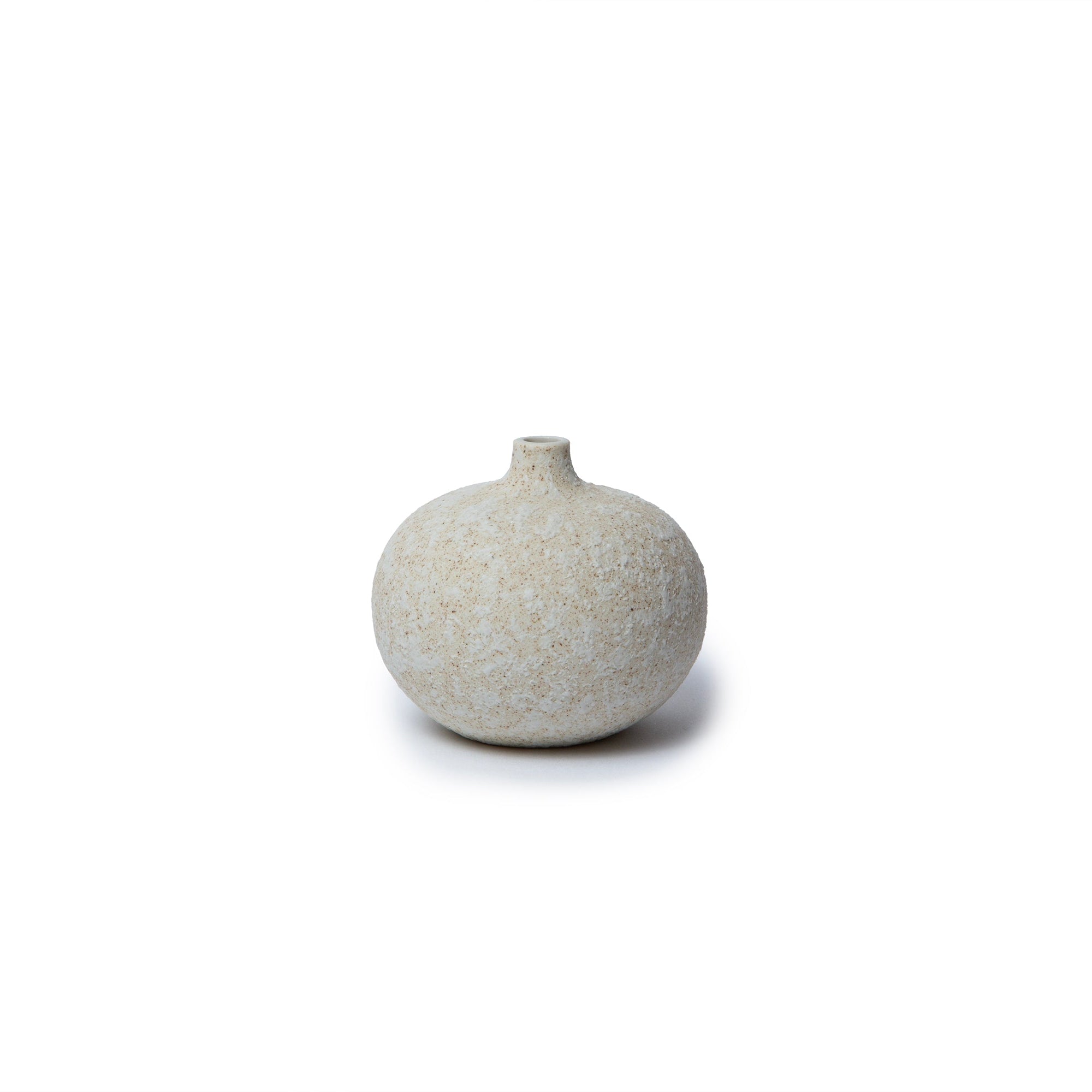 A small round ceramic vase with a short neck, featuring a speckled beige and off-white glaze, centered on a solid white background.