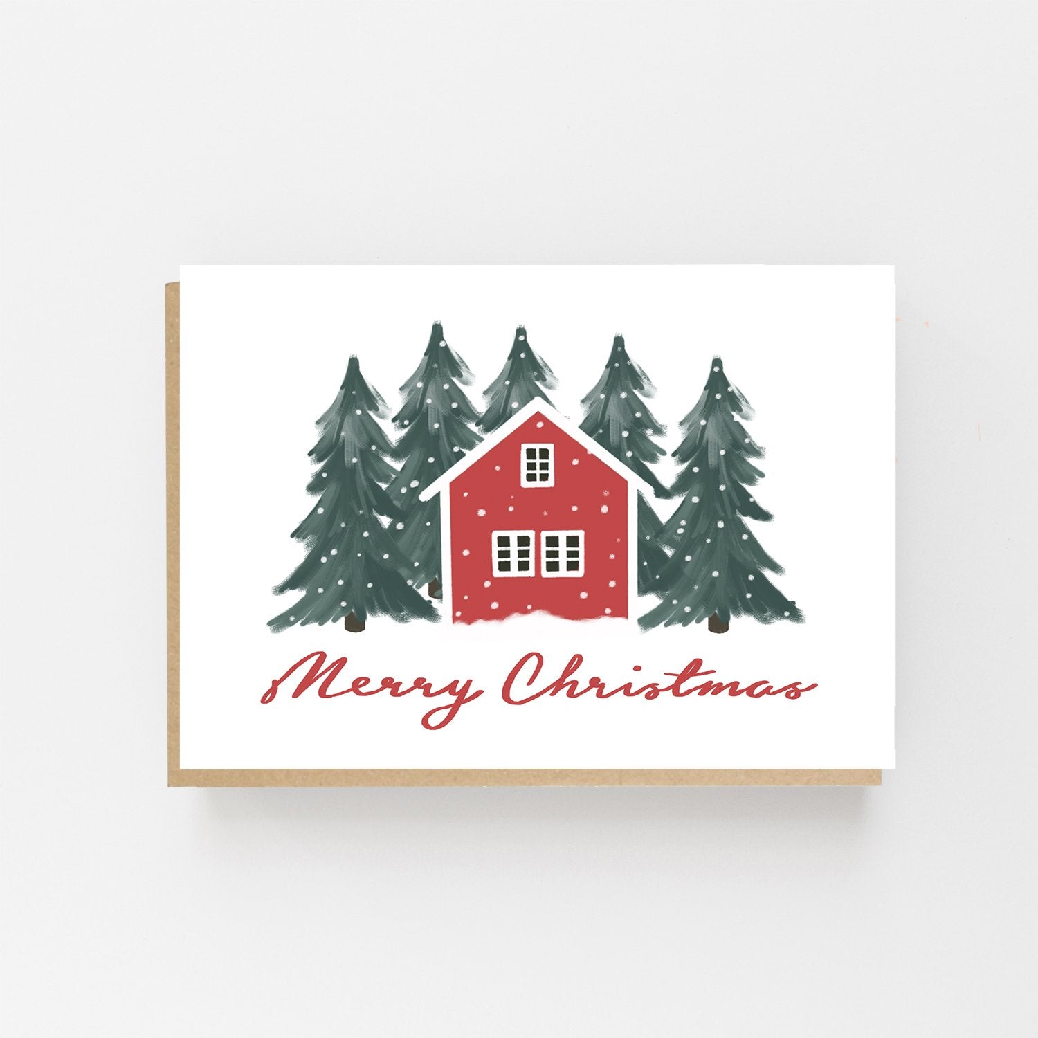 Christmas card with a red house and trees on a white background