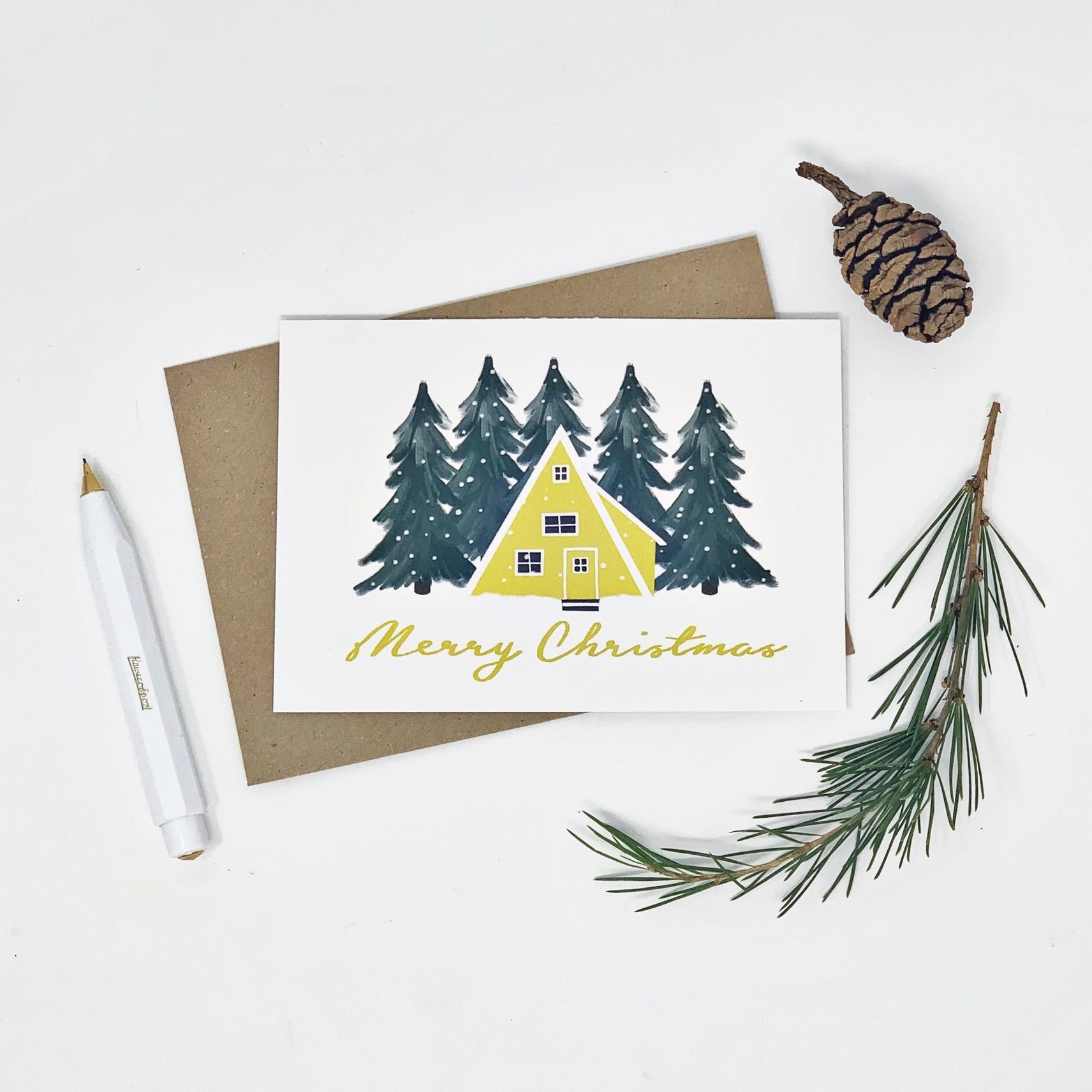 'Merry Christmas' Scandinavian Yellow House Card by Lomond Paper Co