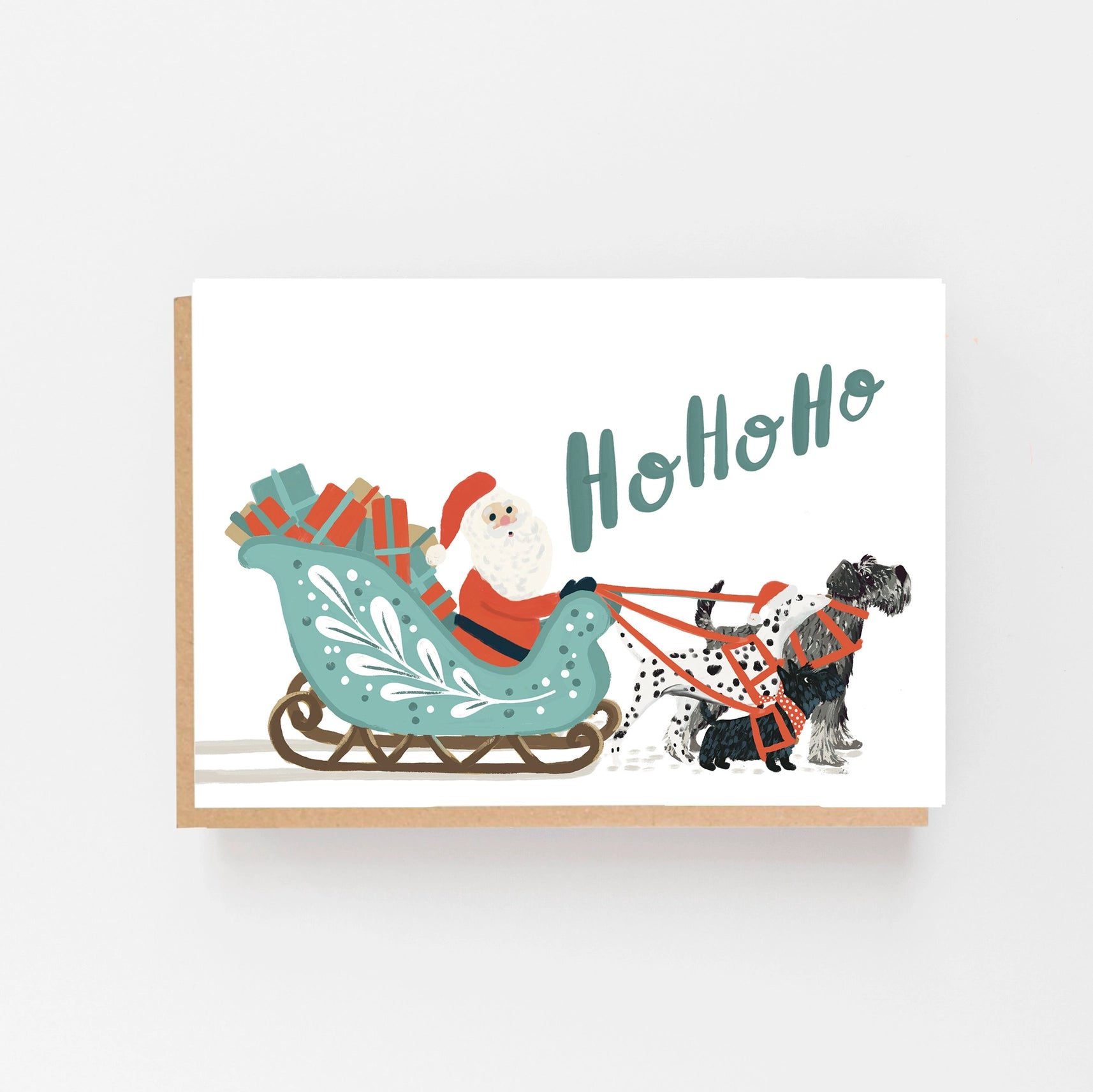 Christmas card with Santa Claus in a sleigh pulled by dogs and 'Ho Ho Ho' text on a white background.
