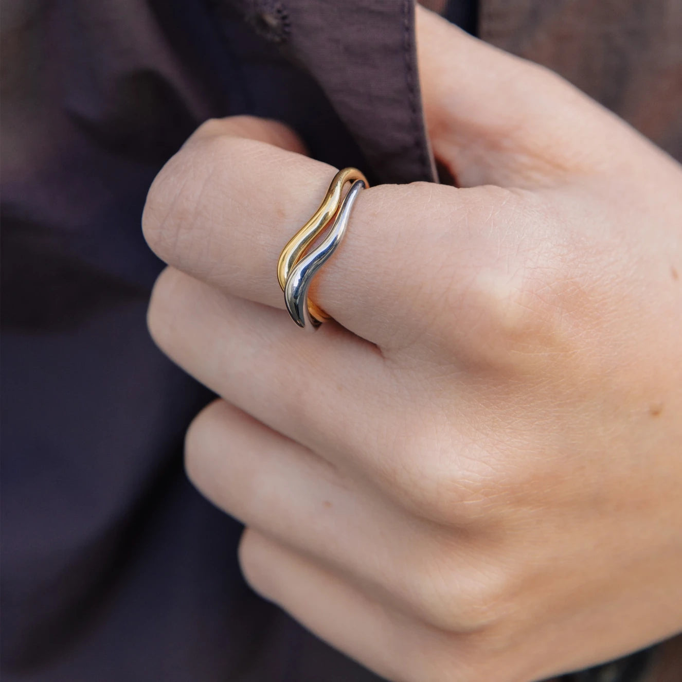 Gold & Silver Entwined Ring - Water Resistant Plating by Nordic Muse being worn by a model