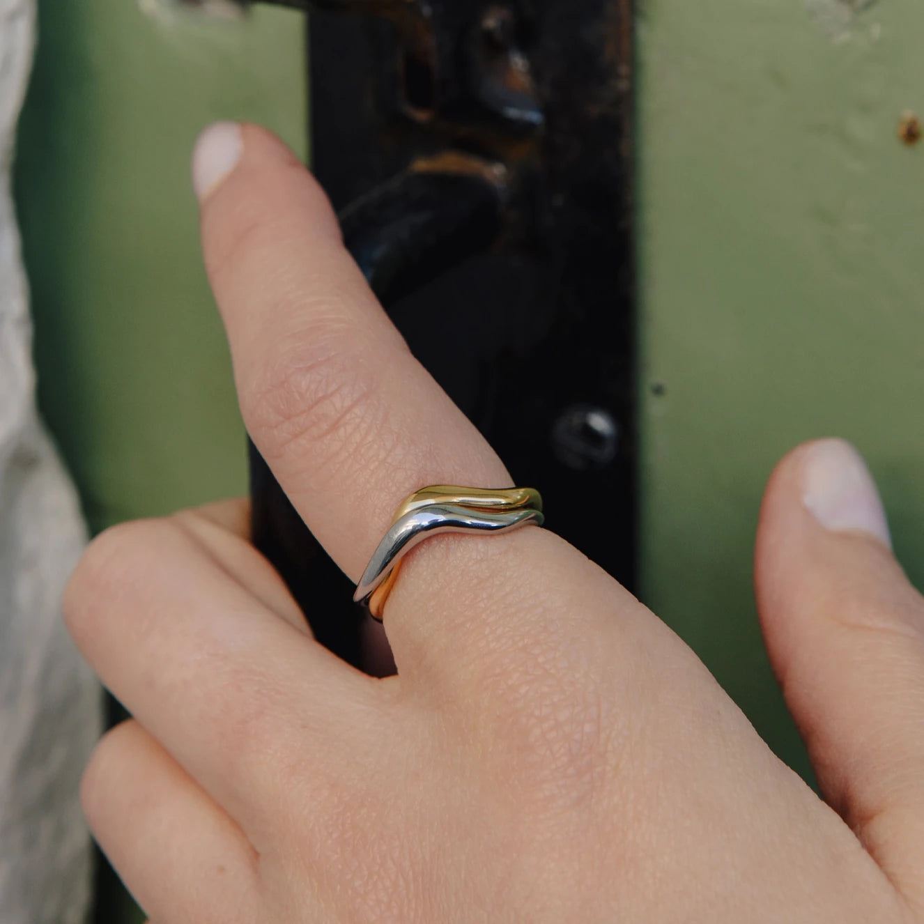 Gold & Silver Entwined Ring - Water Resistant Plating by Nordic Muse being worn by a model