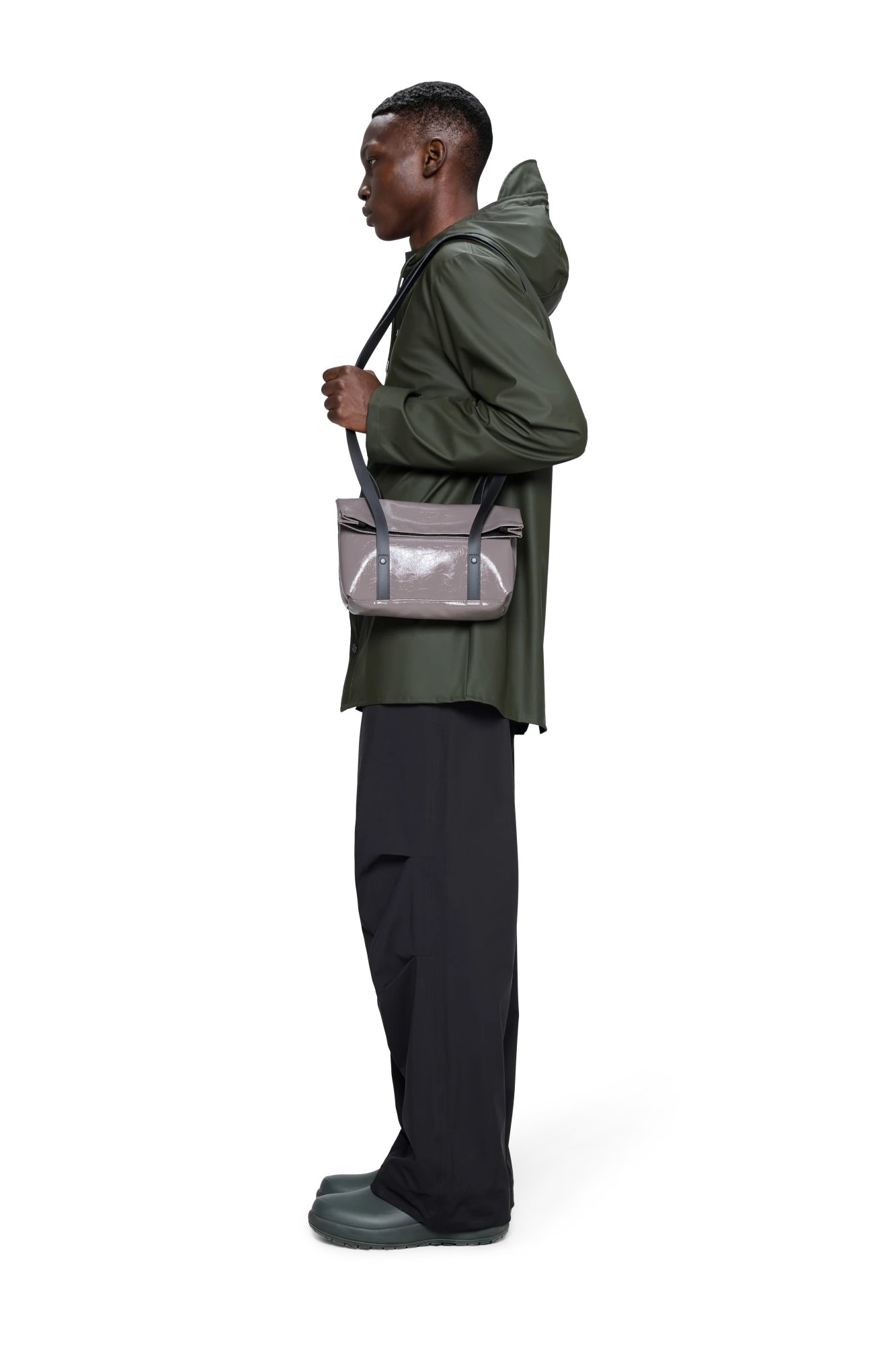 Person wearing Rains 2 Strap Crossbody Bag in Cinder Glaze | Lifesto