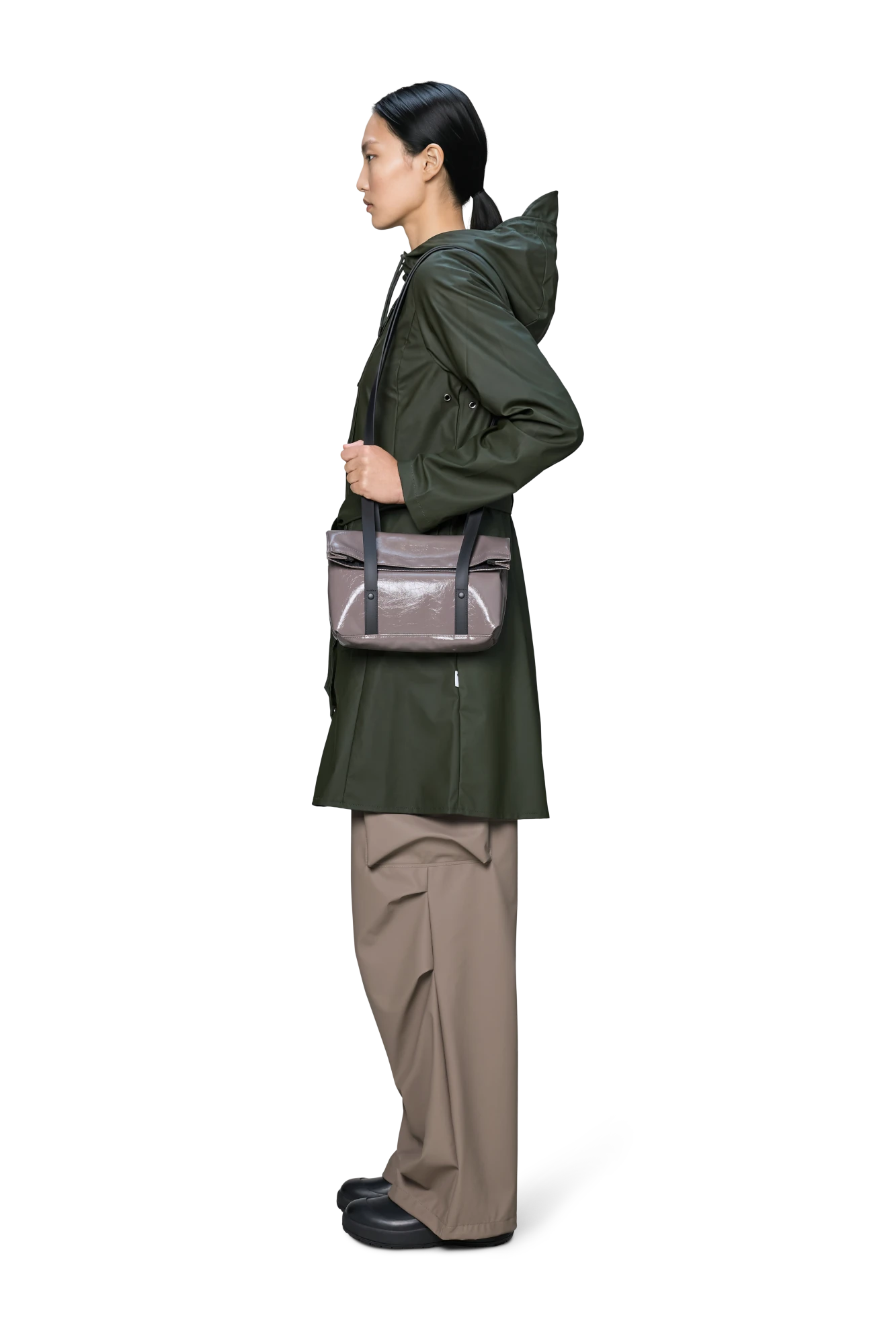 Person wearing Rains 2 Strap Crossbody Bag in Cinder Glaze | Lifestory