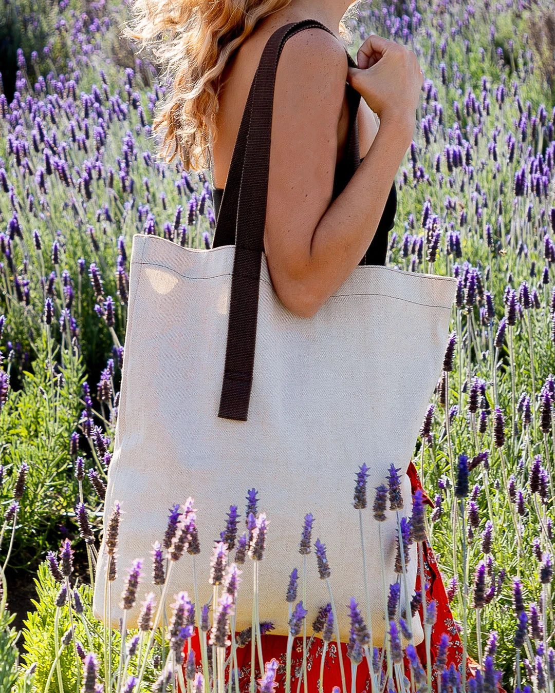 Woman holding a Shangies tote bag in a lavender field | Lifestory