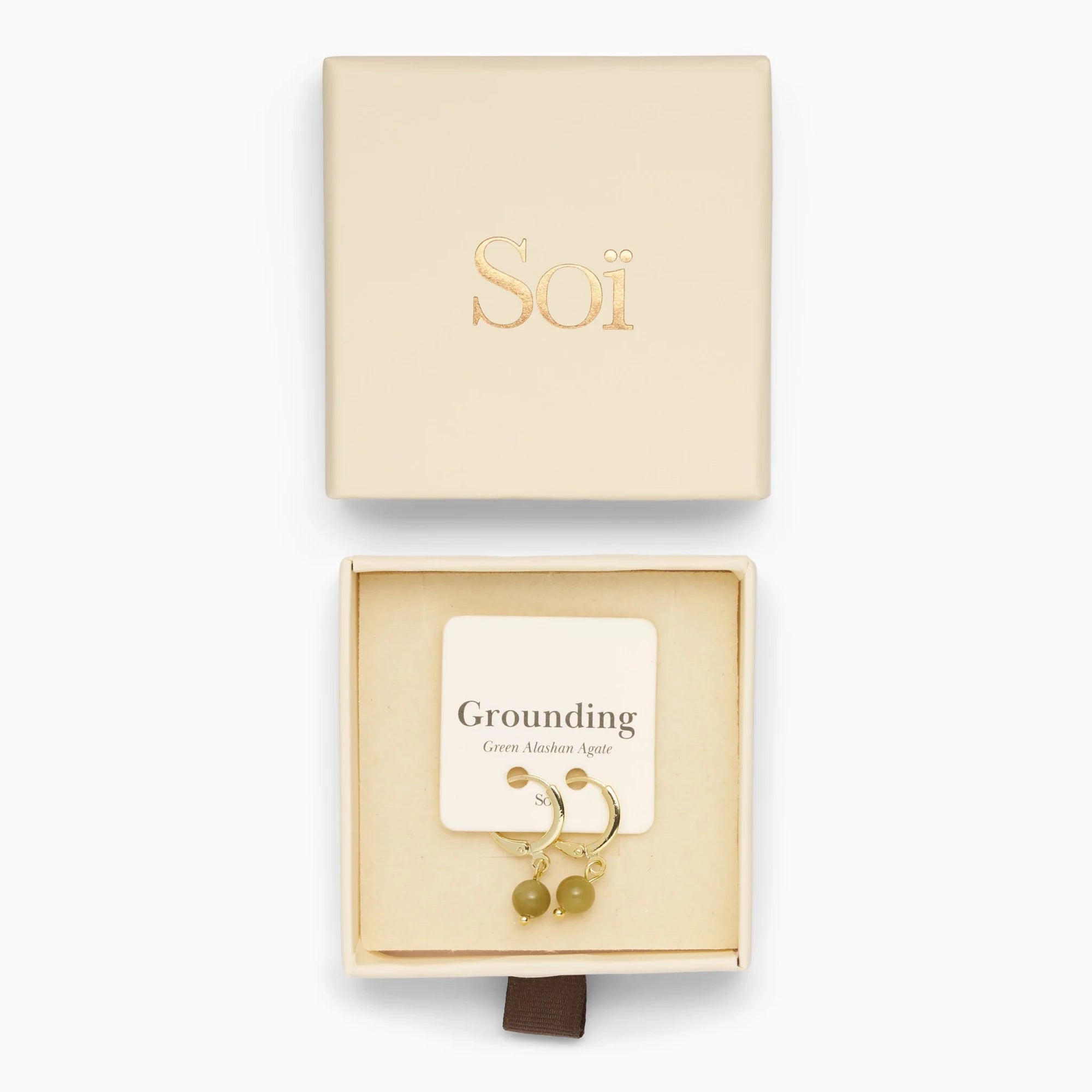 Soï Copenhagen Ava huggie hoop earrings in 18k gold with a Green Alashan Agate stone jewellery box