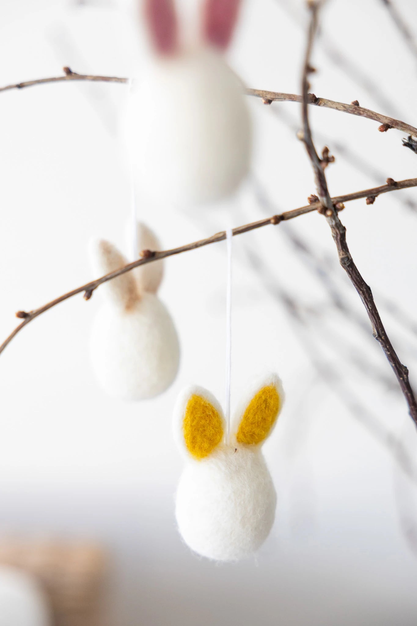 Hedvig Felt Hanging Easter Bunnies in Various Colours by Storefactory - Lifestory