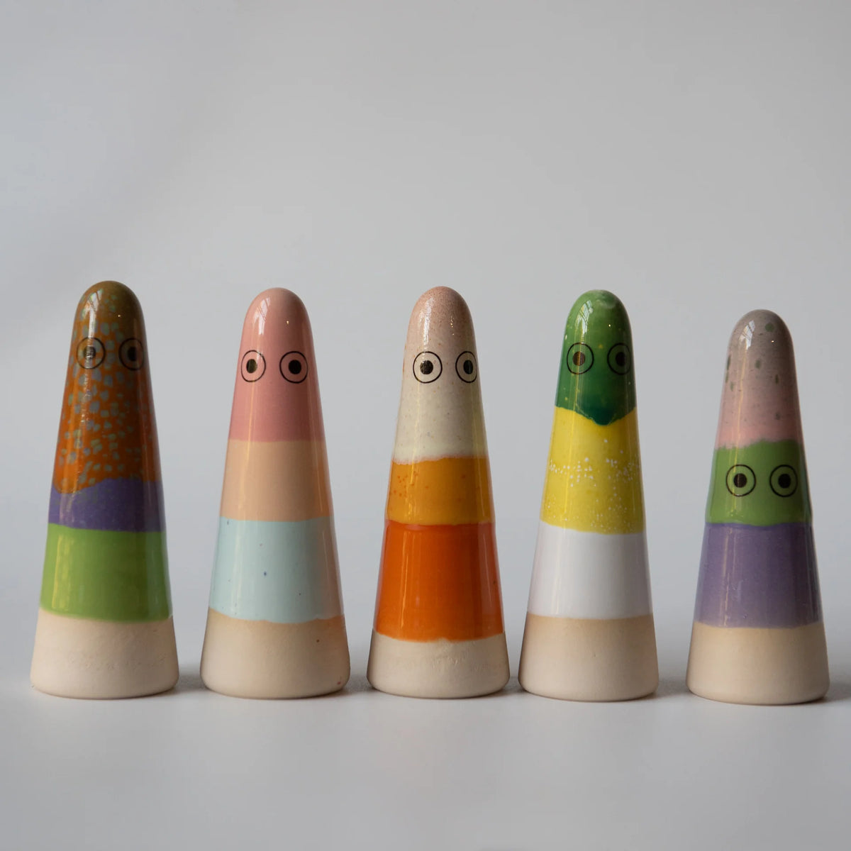 A collection of 5 studio arhoj striped ghosts