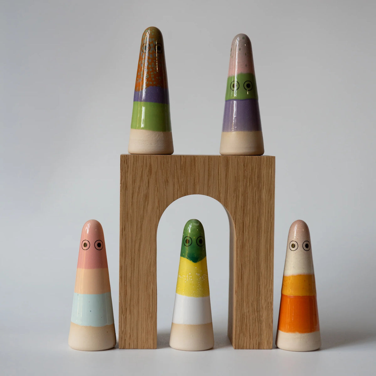 A collection of 5 striped Studio Arhoj ghosts