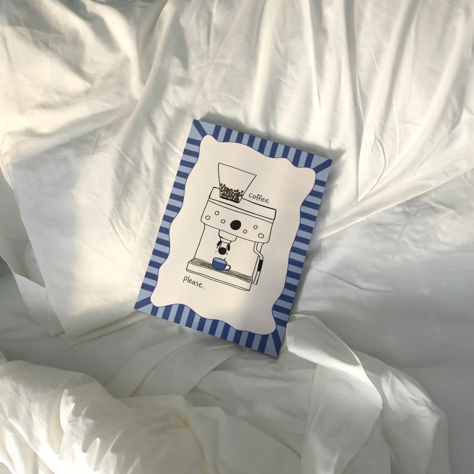 Tecari Designs 'Coffee Please' A4 Unframed Print lying on white bed lienn