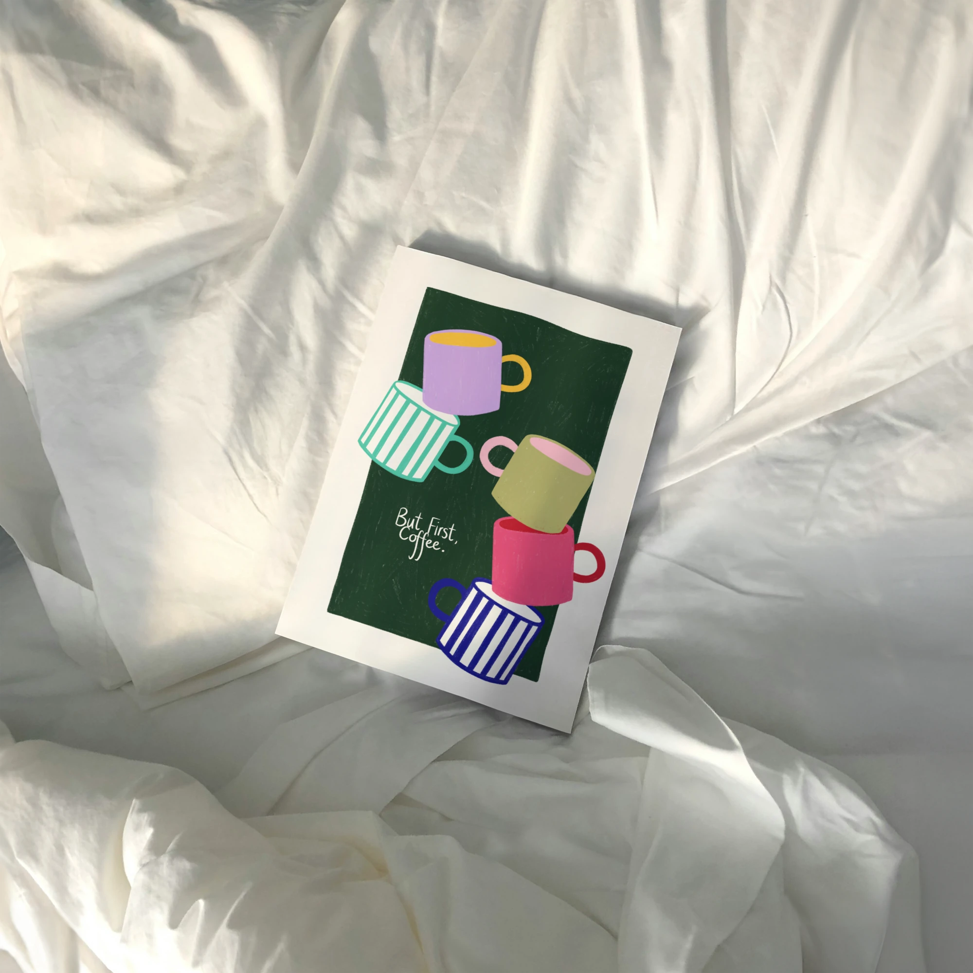 Tecari Designs 'But First, Coffee' A5 Unframed Print on white bedding linen